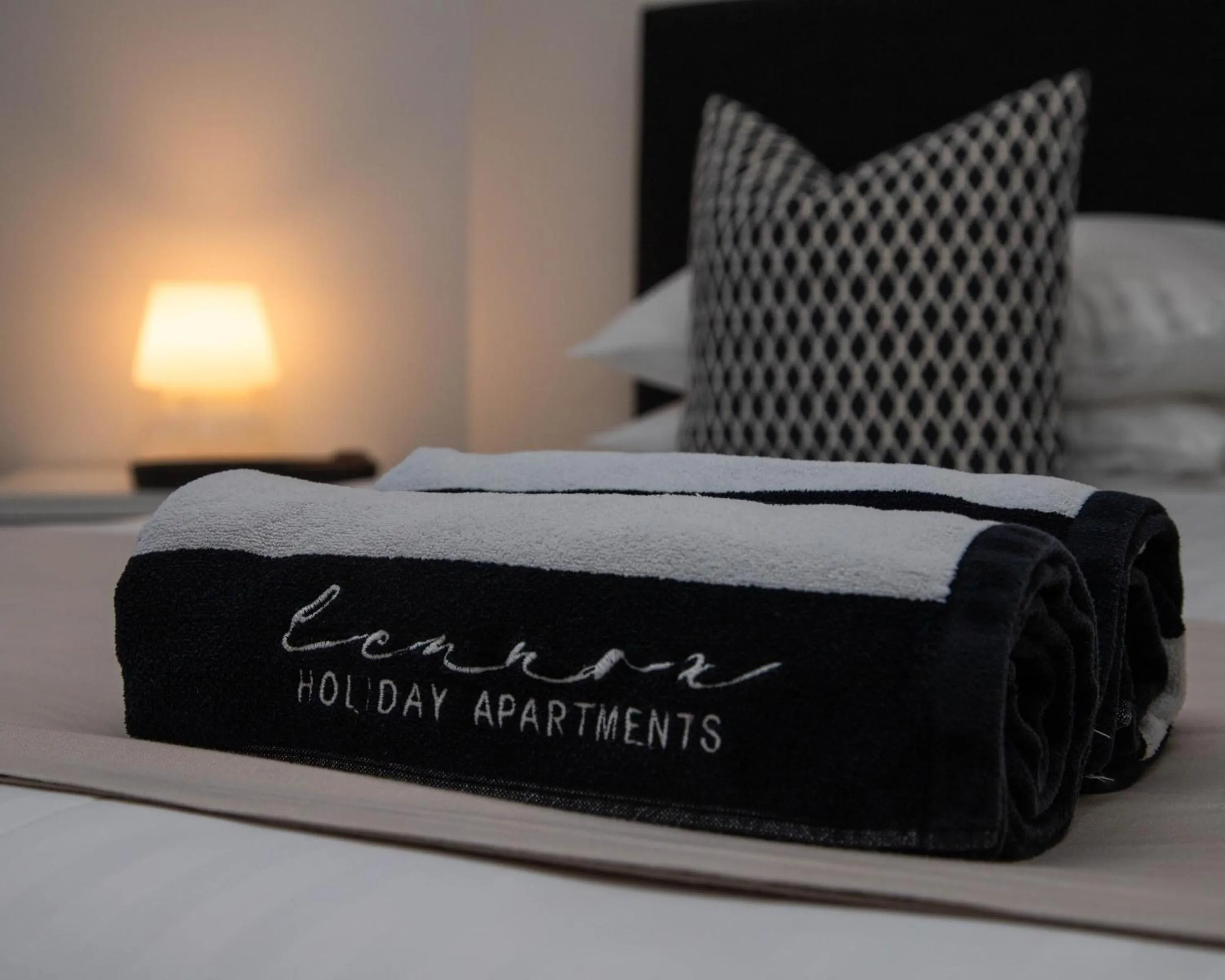 Bed in Lennox Holiday Apartments