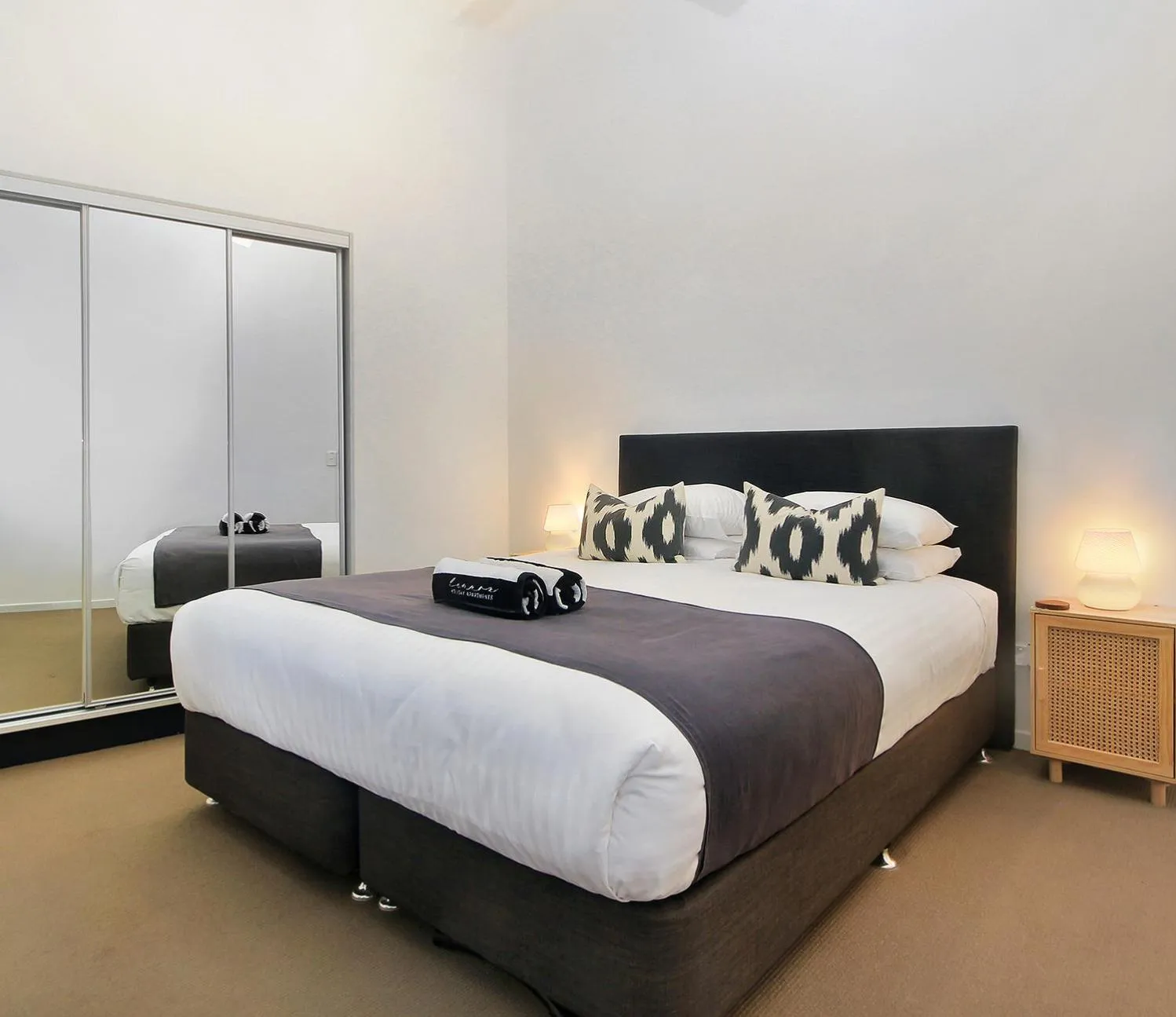 Bed in Lennox Holiday Apartments