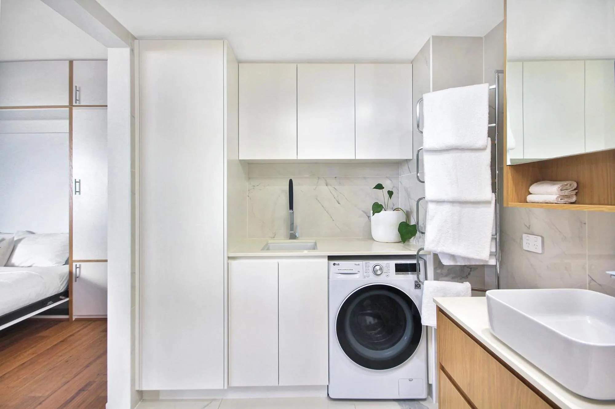 washing machine in Lennox Holiday Apartments
