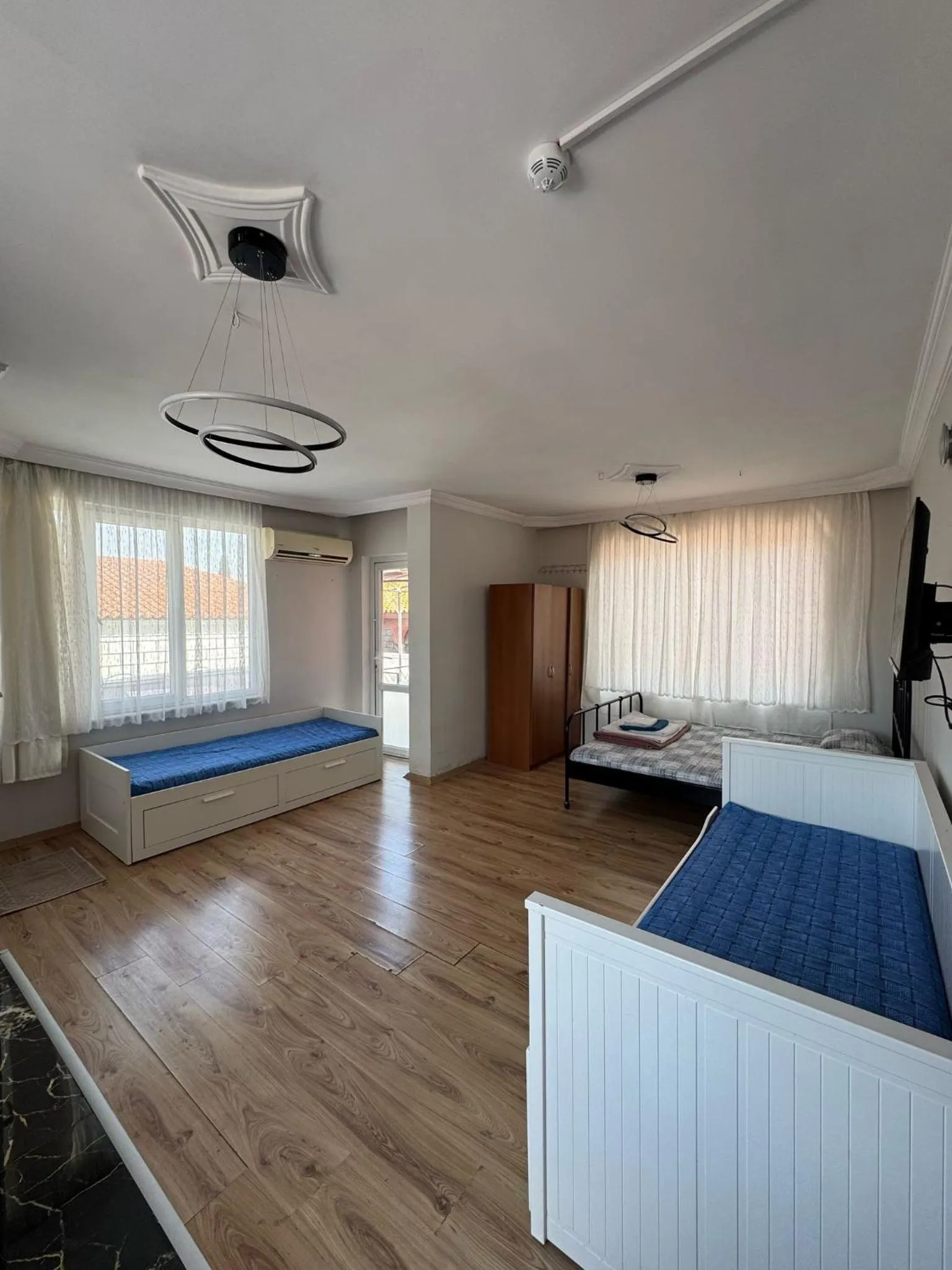 Seating area, Bed in Erkal Pension