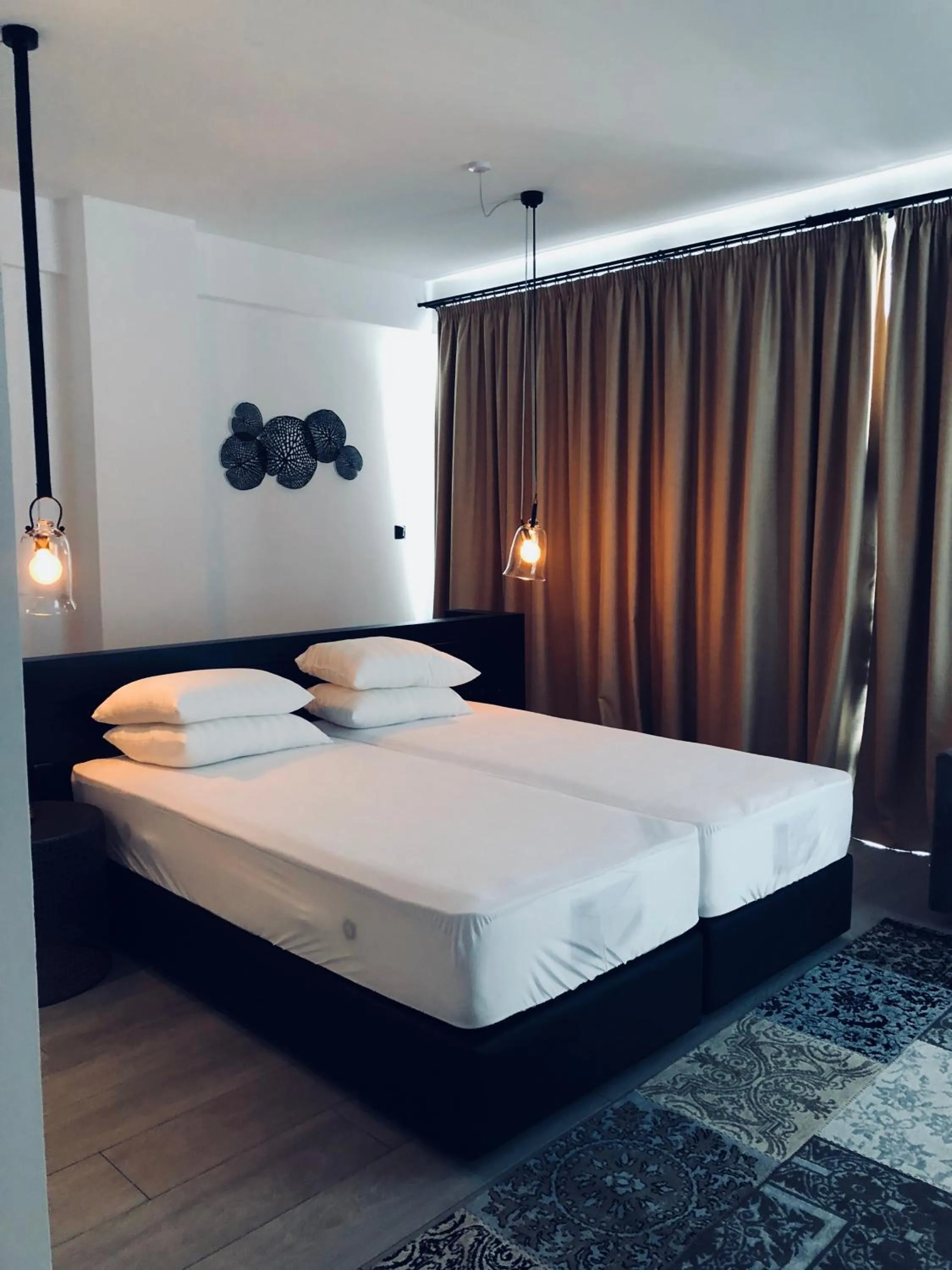 Bed in Abacus Suites