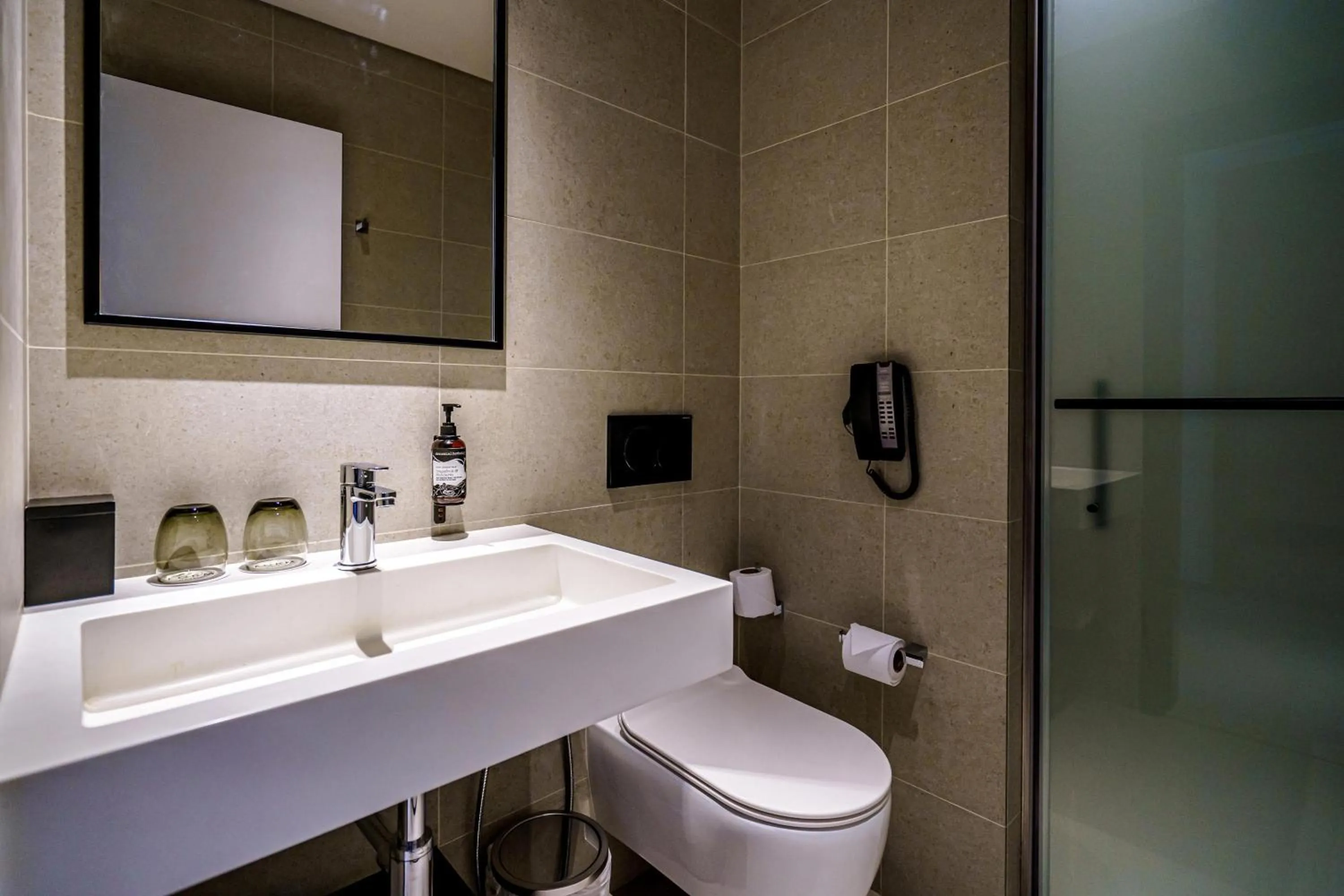 Bathroom in FORM Hotel Al Jaddaf, Dubai, a Member of Design Hotels