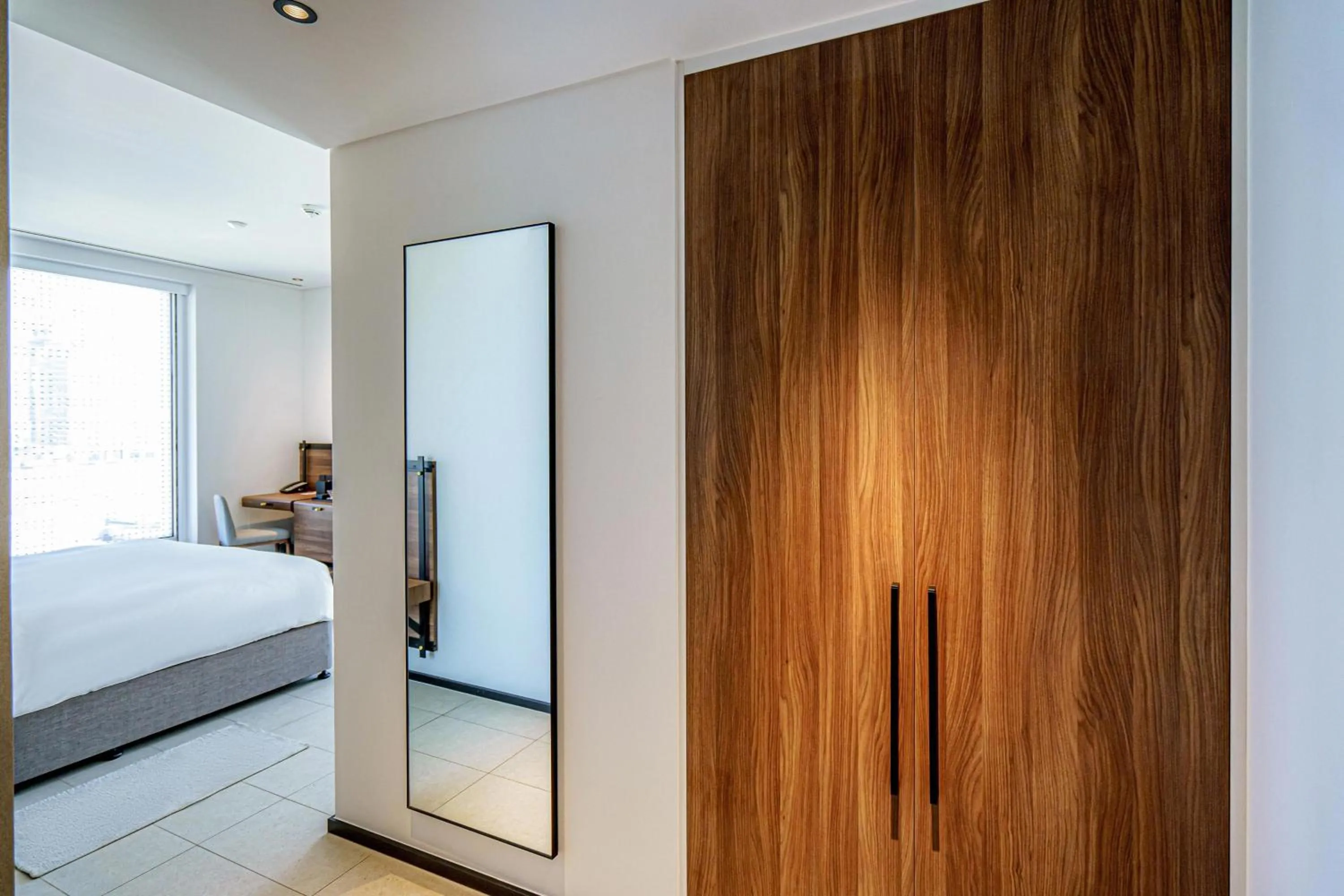 Photo of the whole room, Bed in FORM Hotel Al Jaddaf, Dubai, a Member of Design Hotels