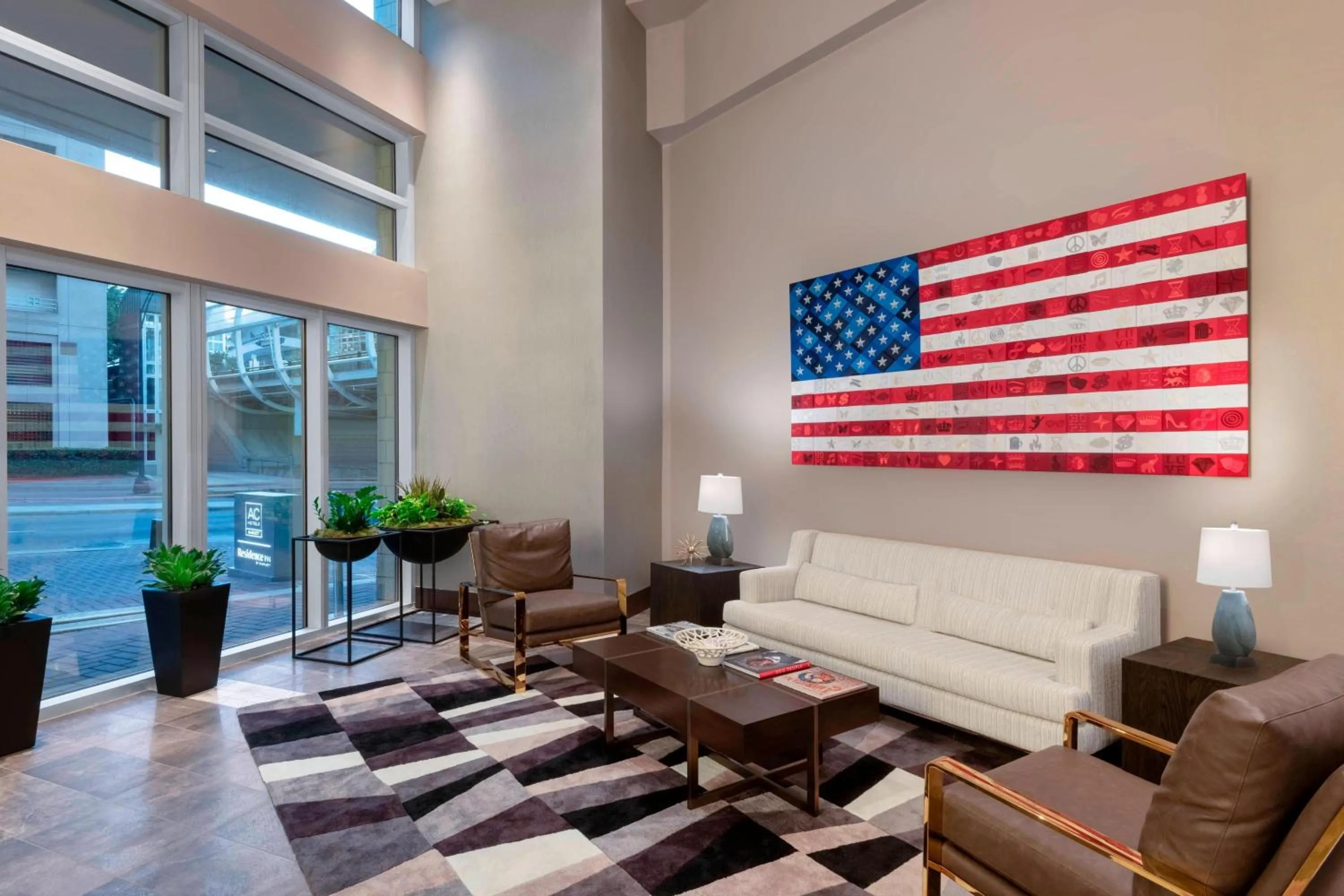 Lobby or reception in AC Hotel by Marriott Charlotte City Center