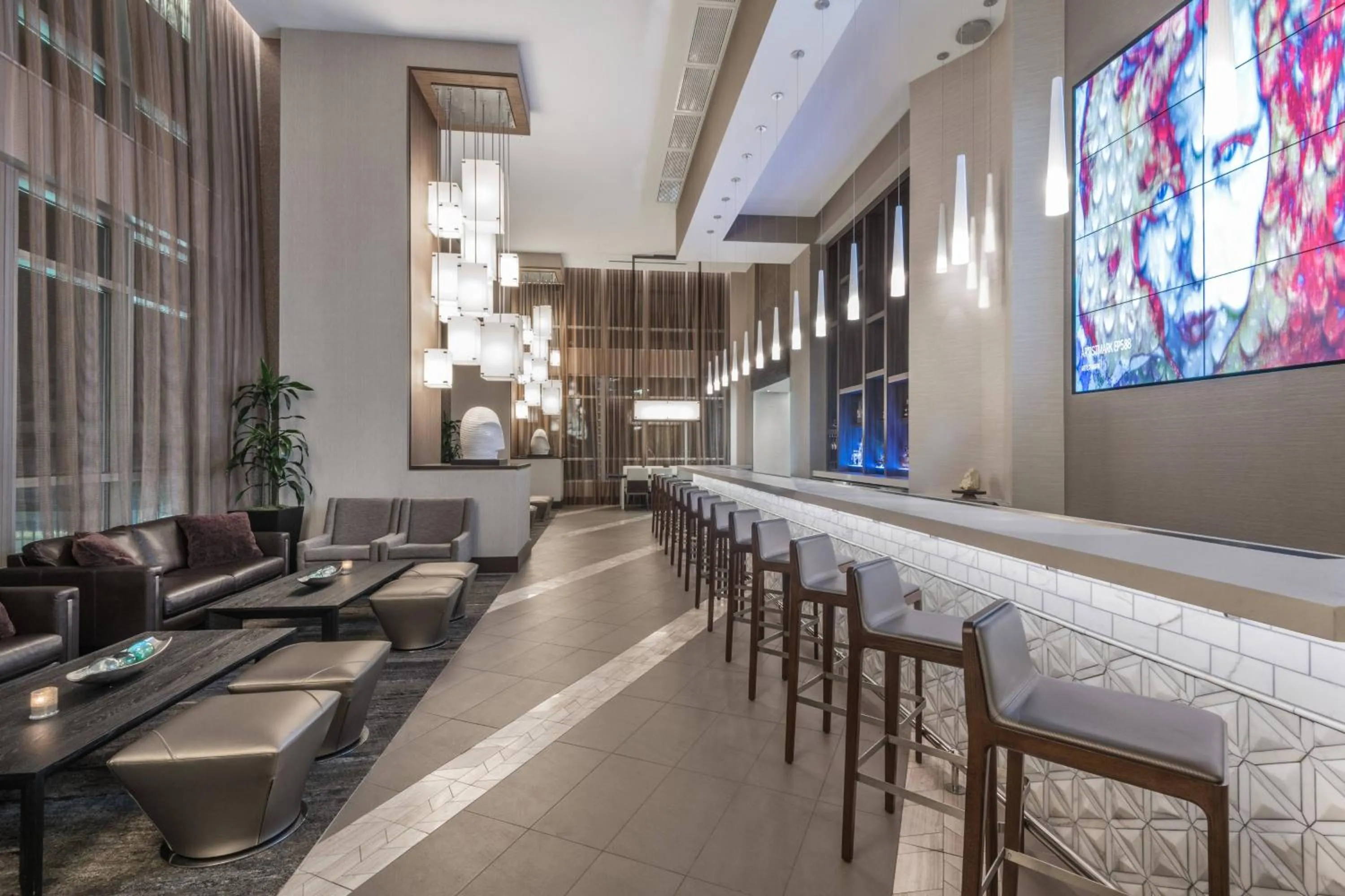 Lounge or bar in AC Hotel by Marriott Charlotte City Center