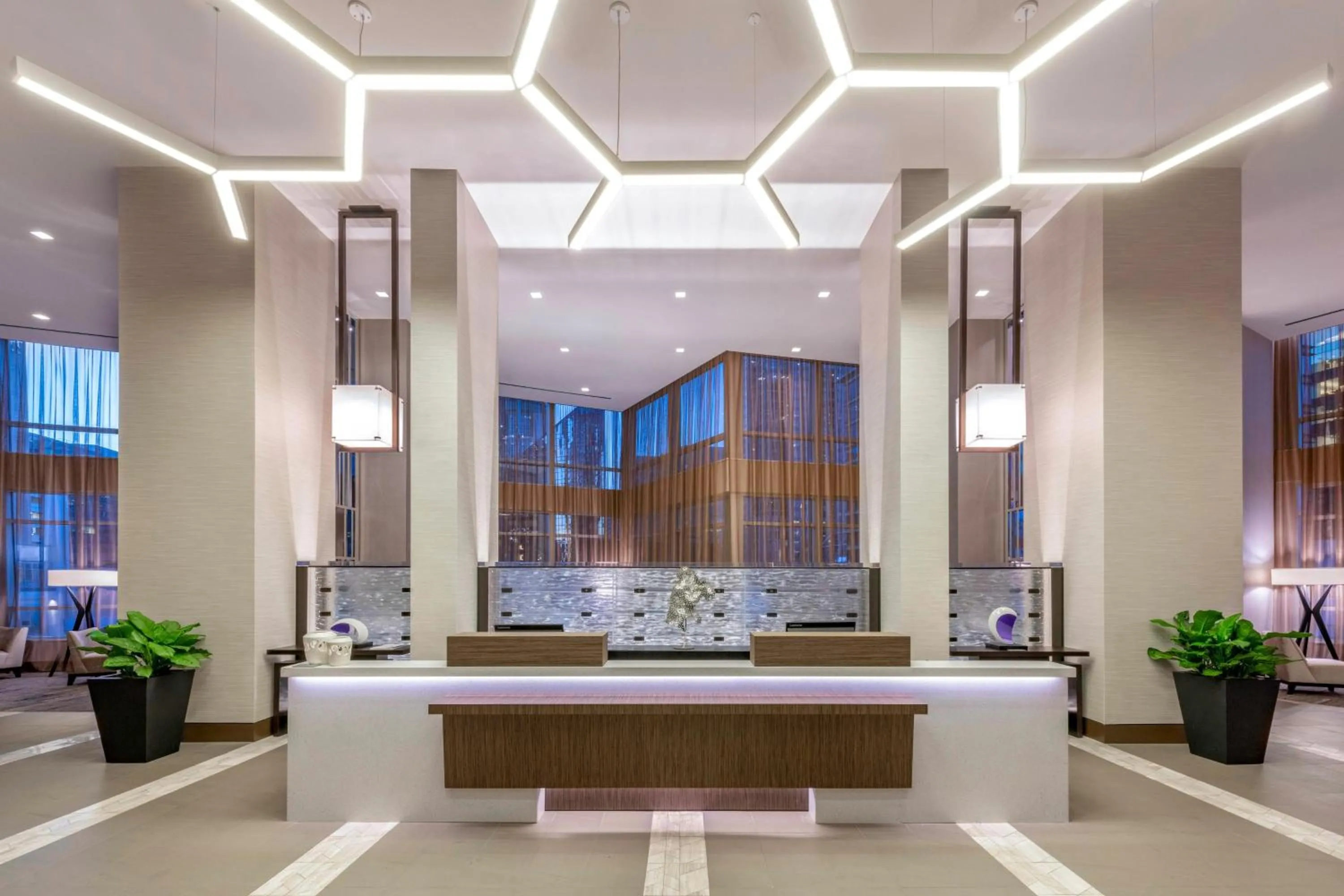 Lobby or reception in AC Hotel by Marriott Charlotte City Center