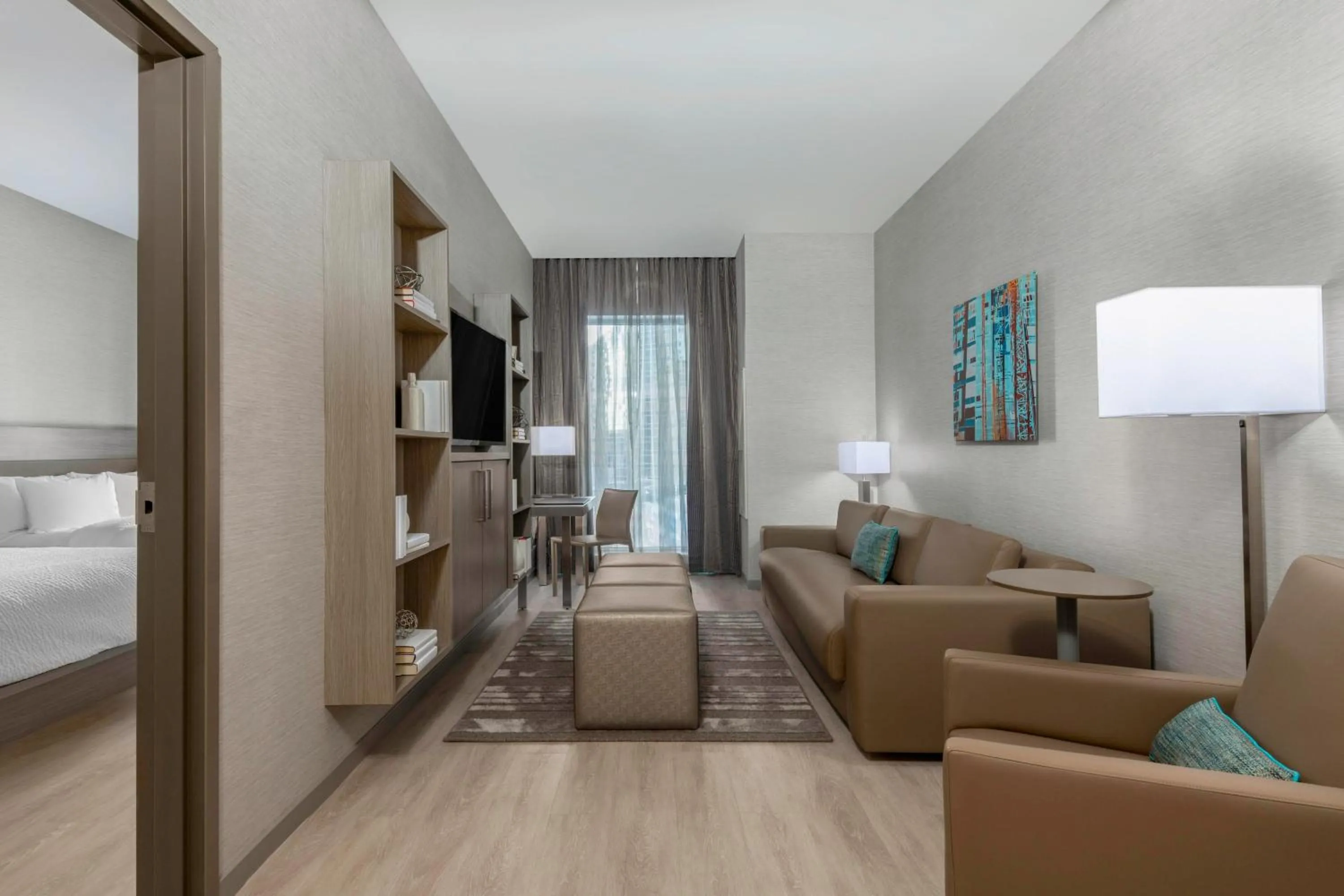 Living room, Bed in AC Hotel by Marriott Charlotte City Center