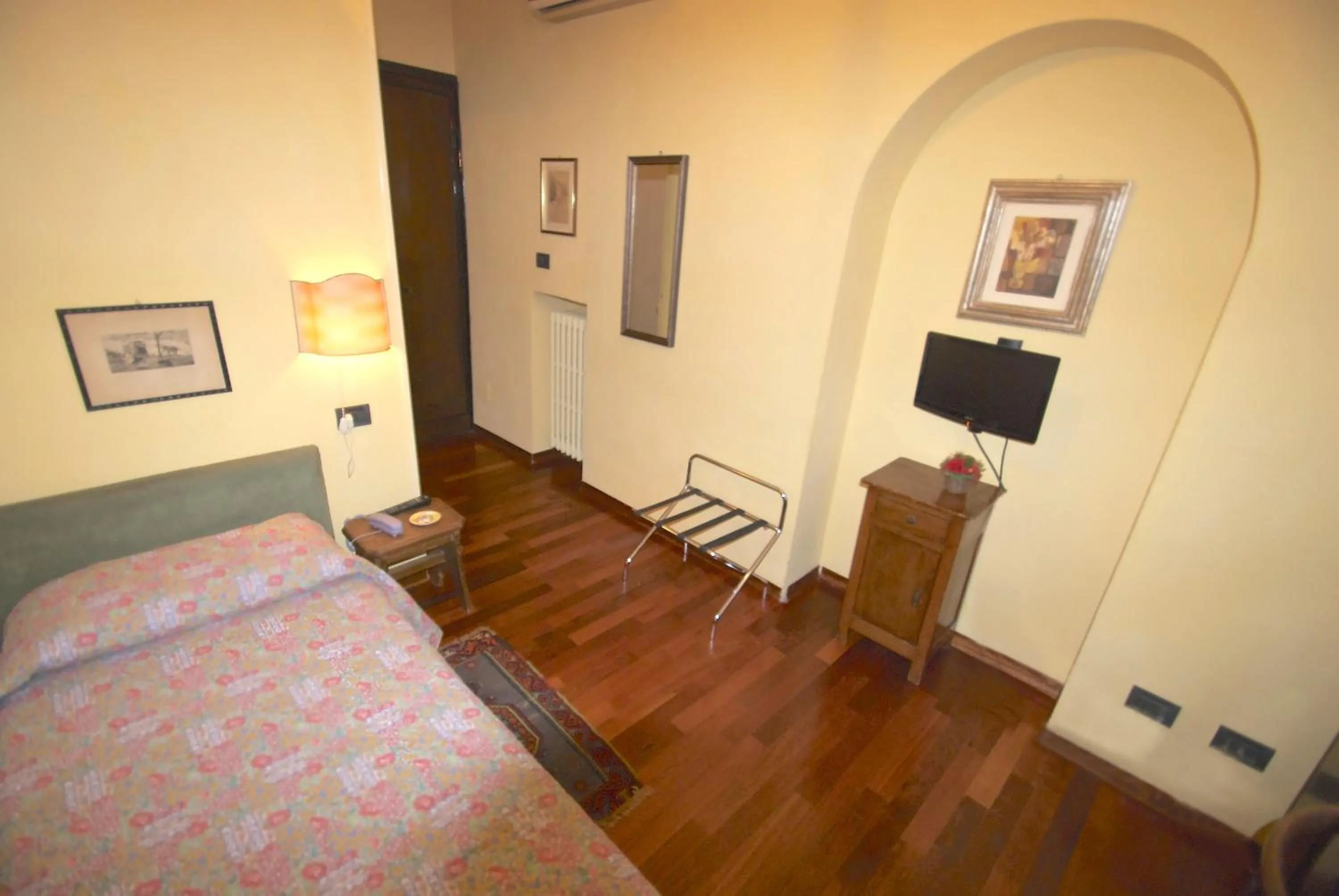 Photo of the whole room, Bed in Locanda Borgonuovo