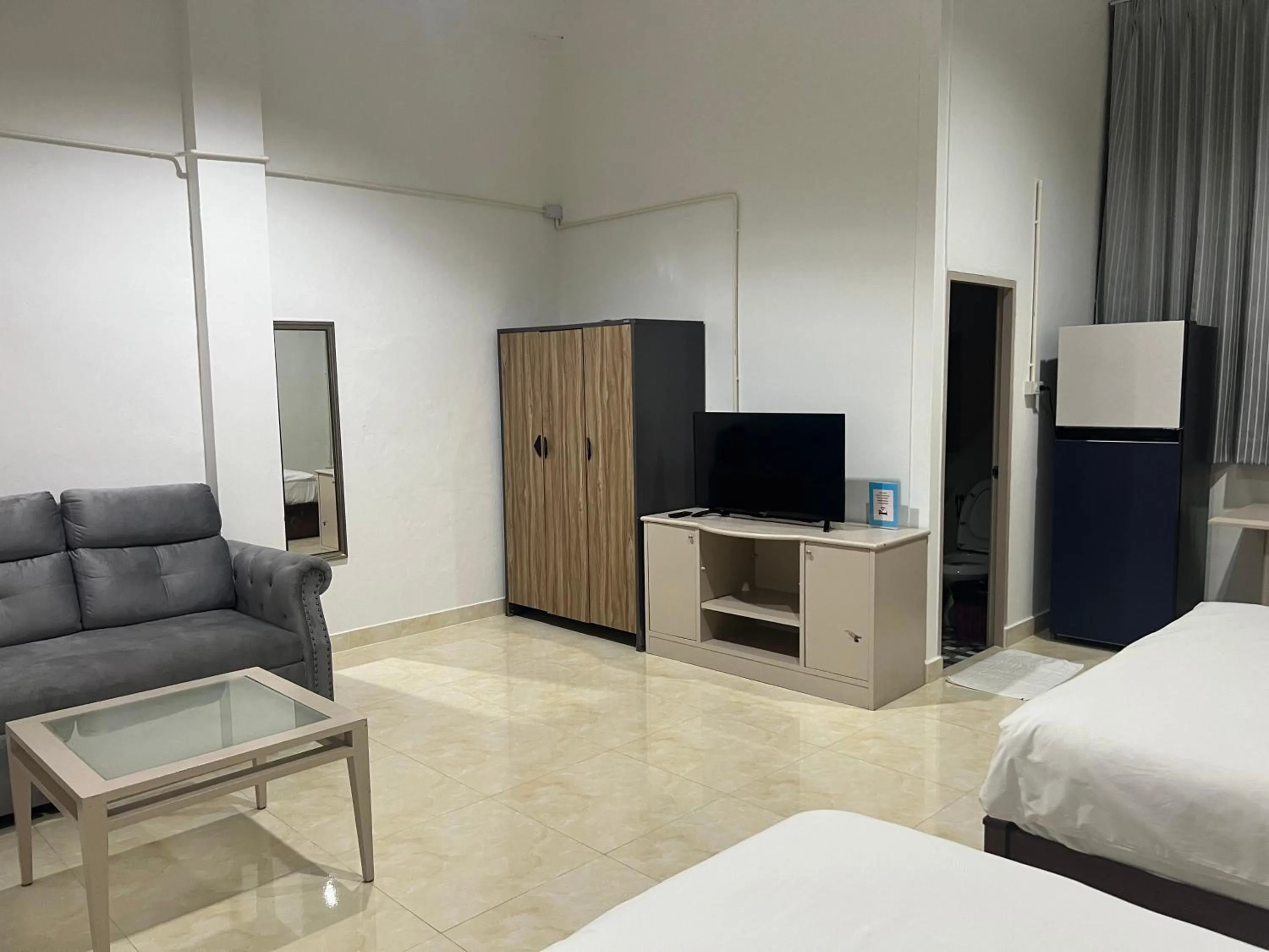 Area and facilities, Bed in Mall Suites Hotel
