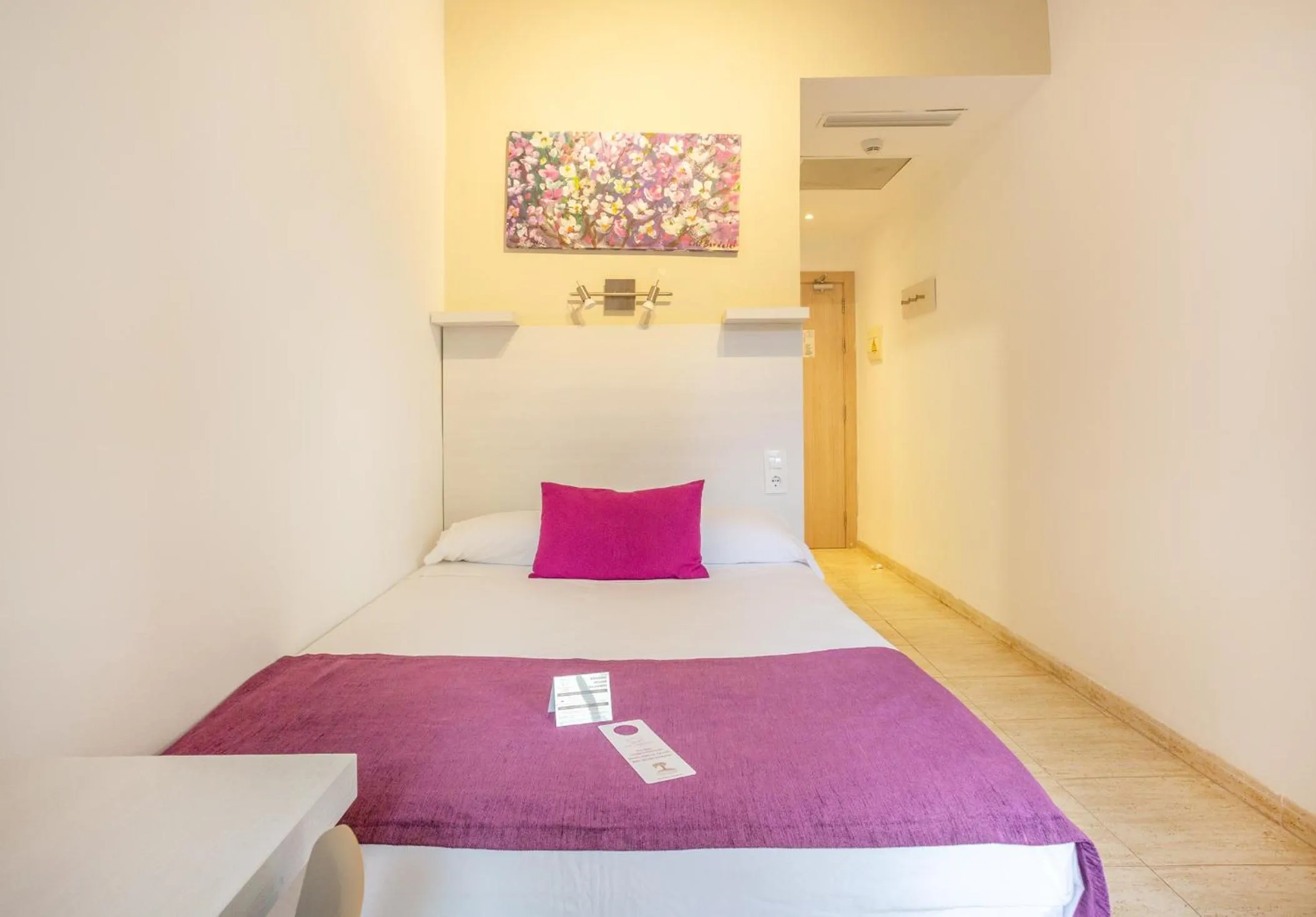 Bed in FLOR los Almendros Hotel