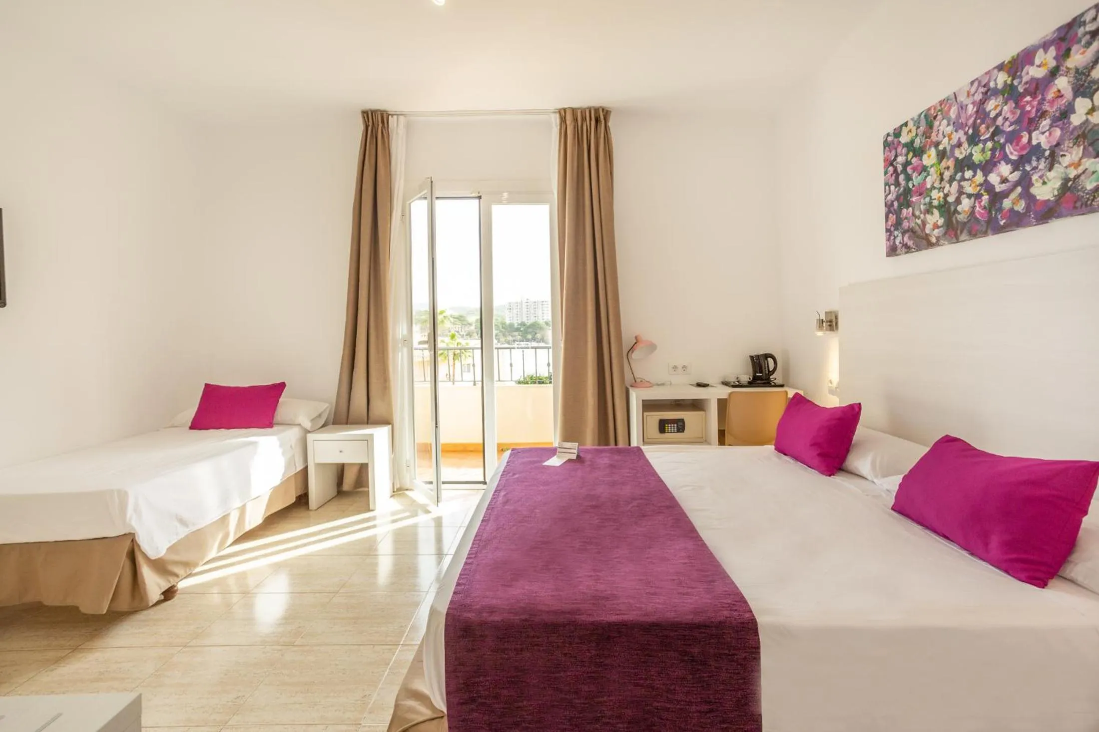 Bed in FLOR los Almendros Hotel