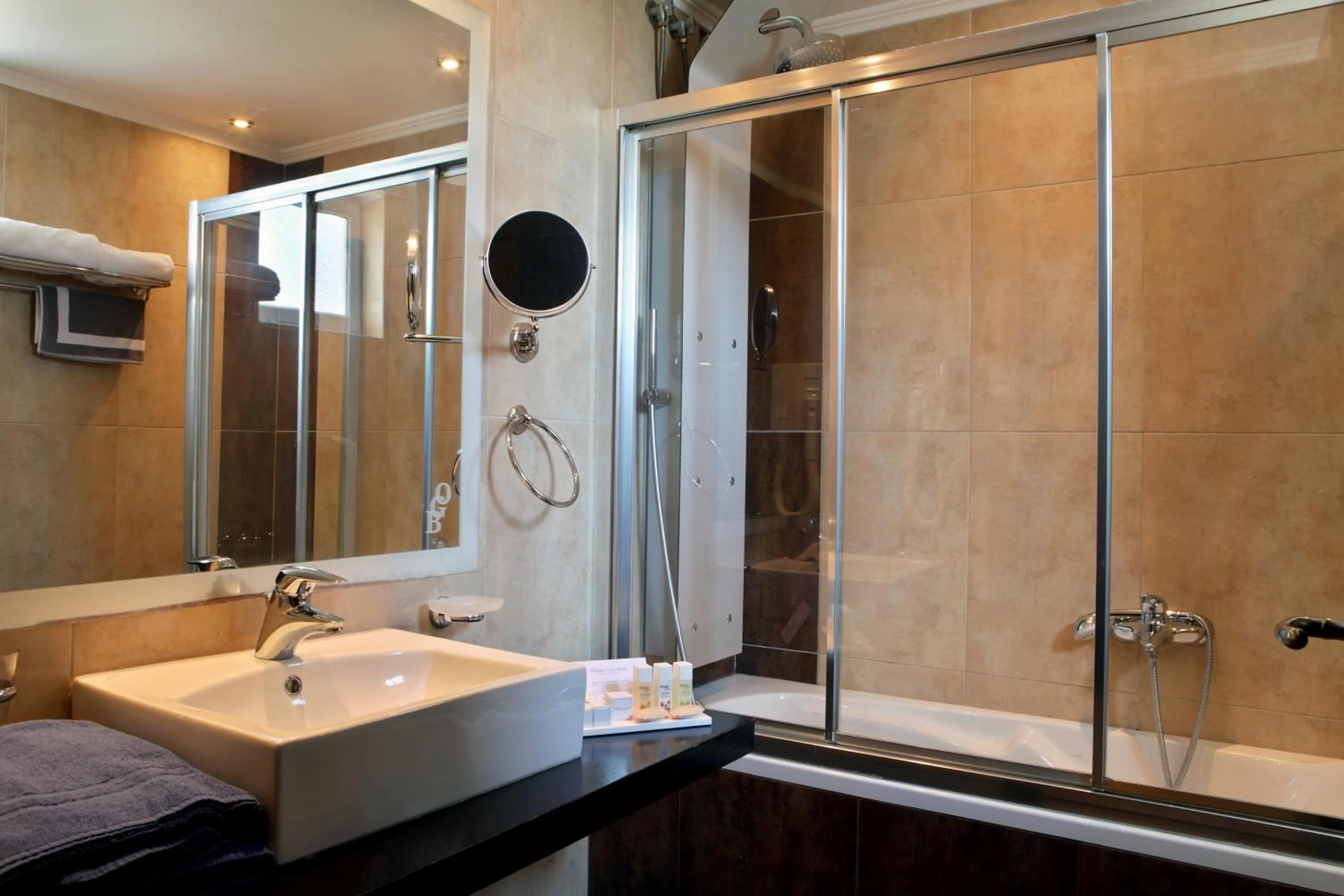 Bathroom in Olympia Golden Beach Resort & Spa