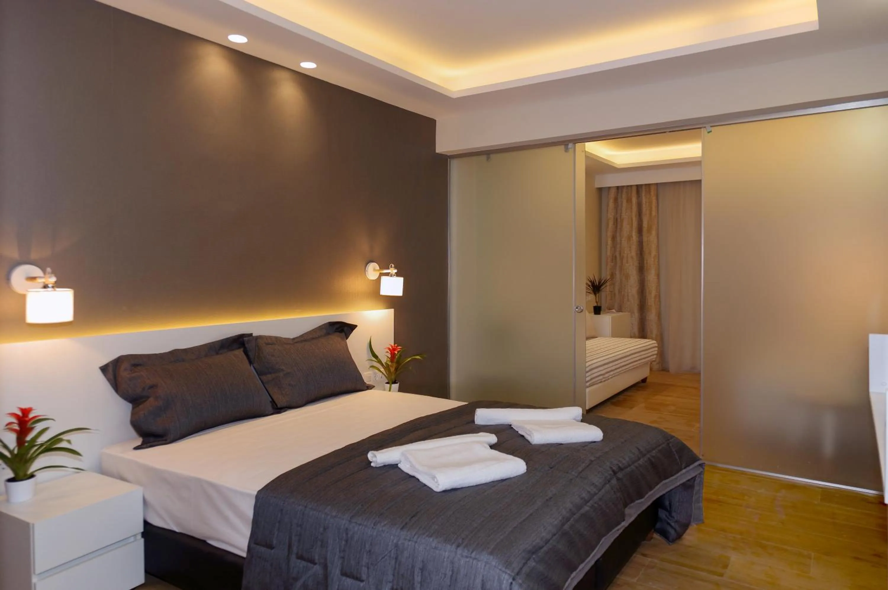 Bed in Poseidon Hotel Sea Resort