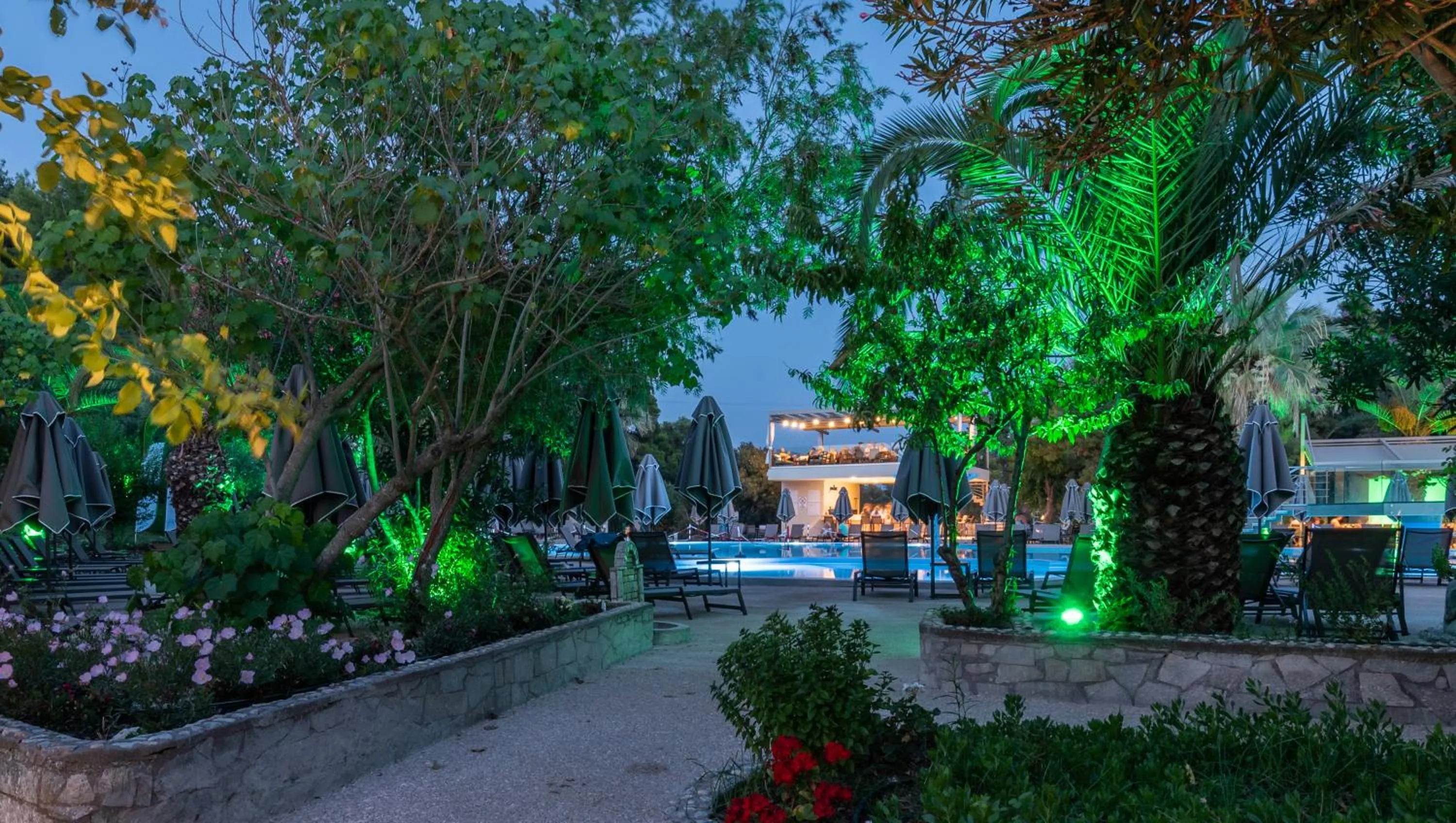 Garden in Poseidon Hotel Sea Resort