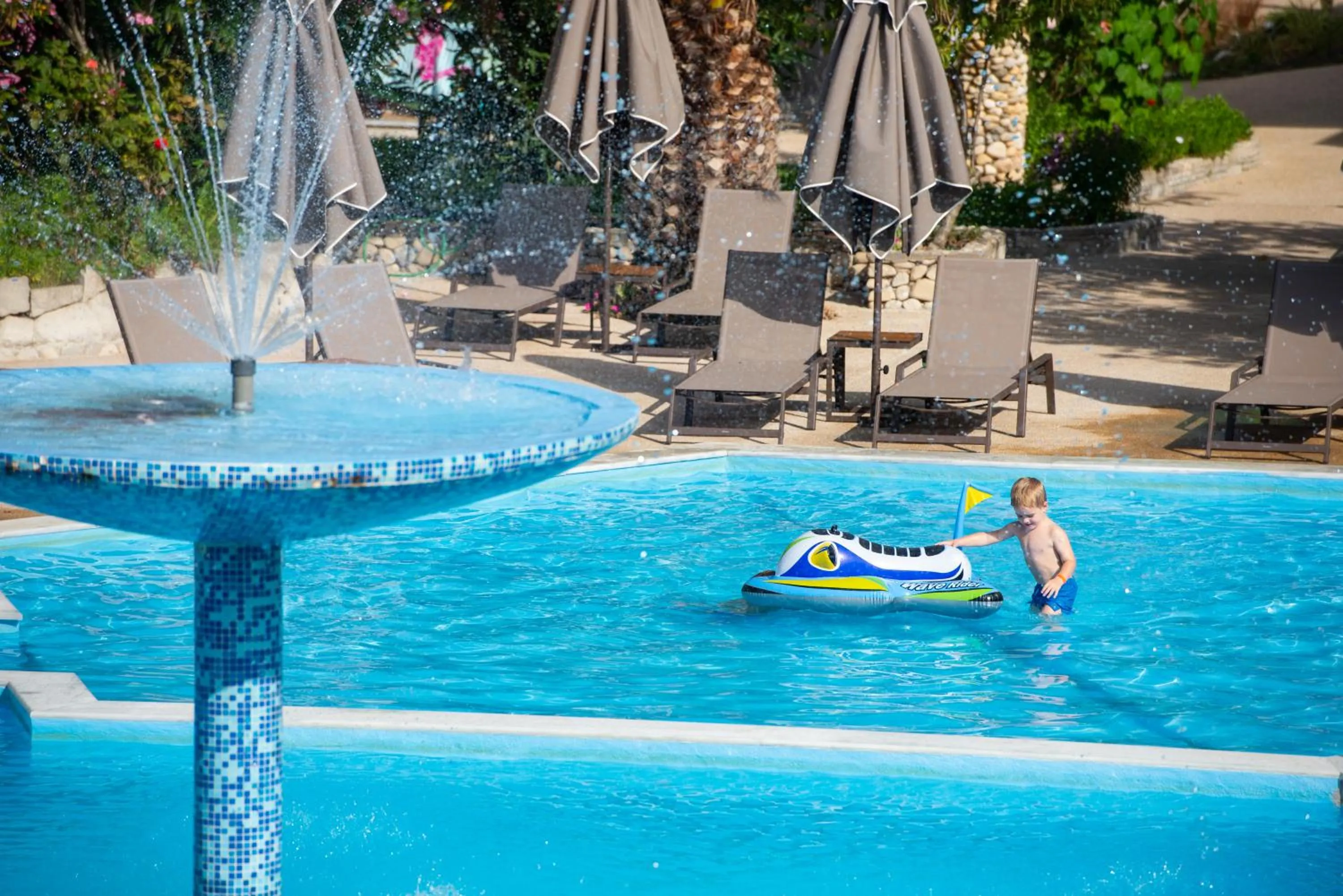 Swimming pool in Poseidon Hotel Sea Resort