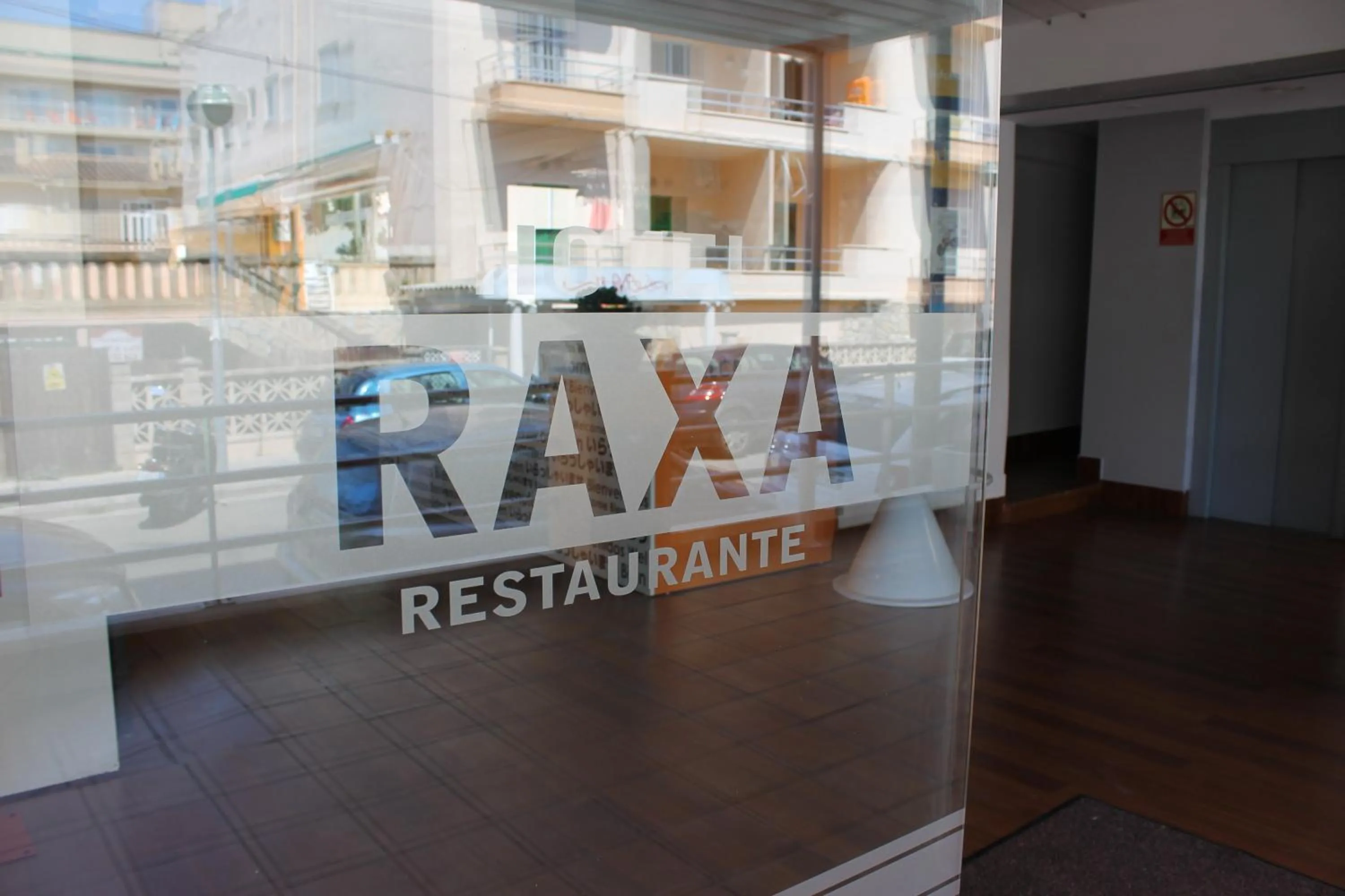 Property logo or sign in Hotel Raxa