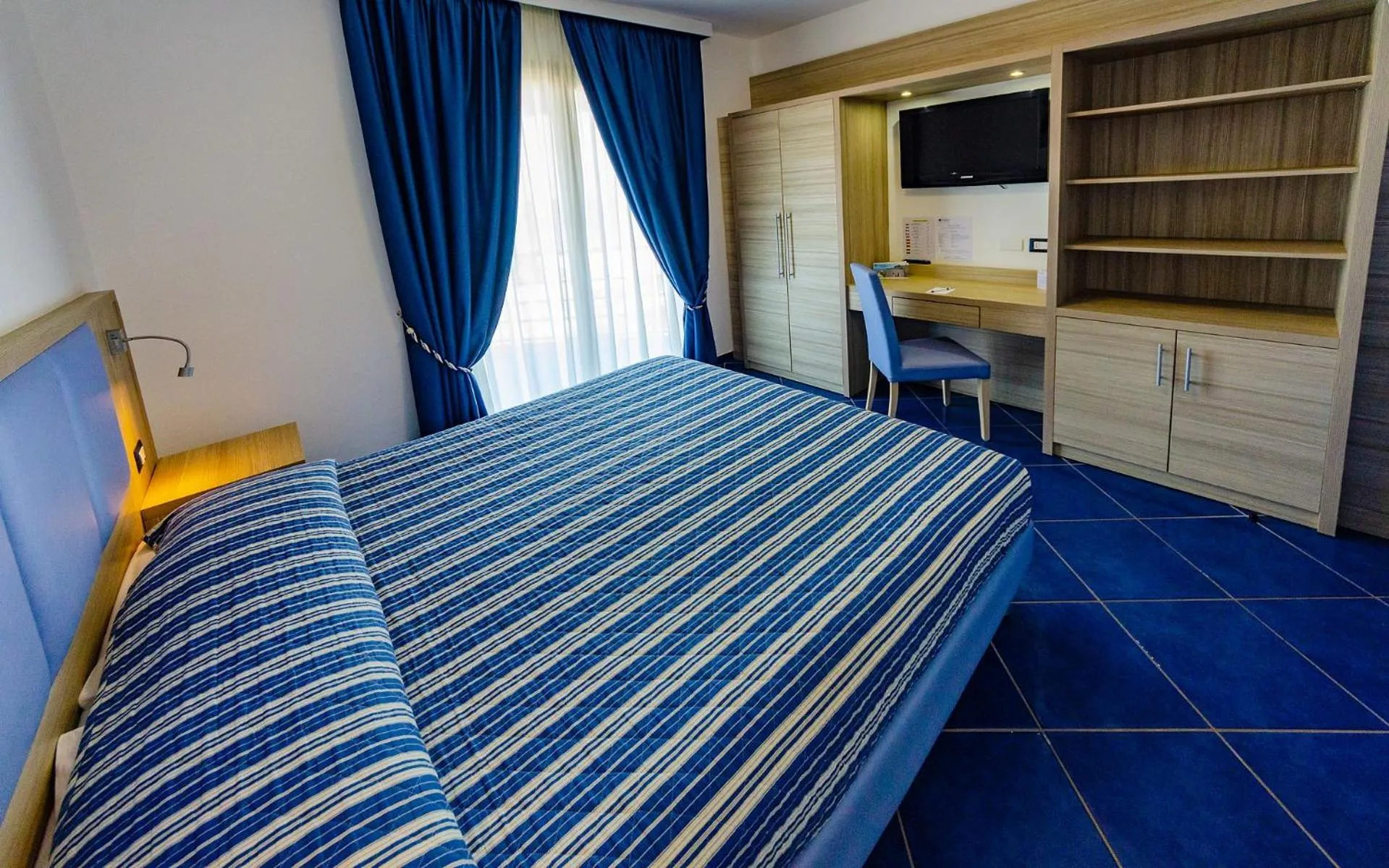 Bedroom, Bed in Astro Suite Hotel