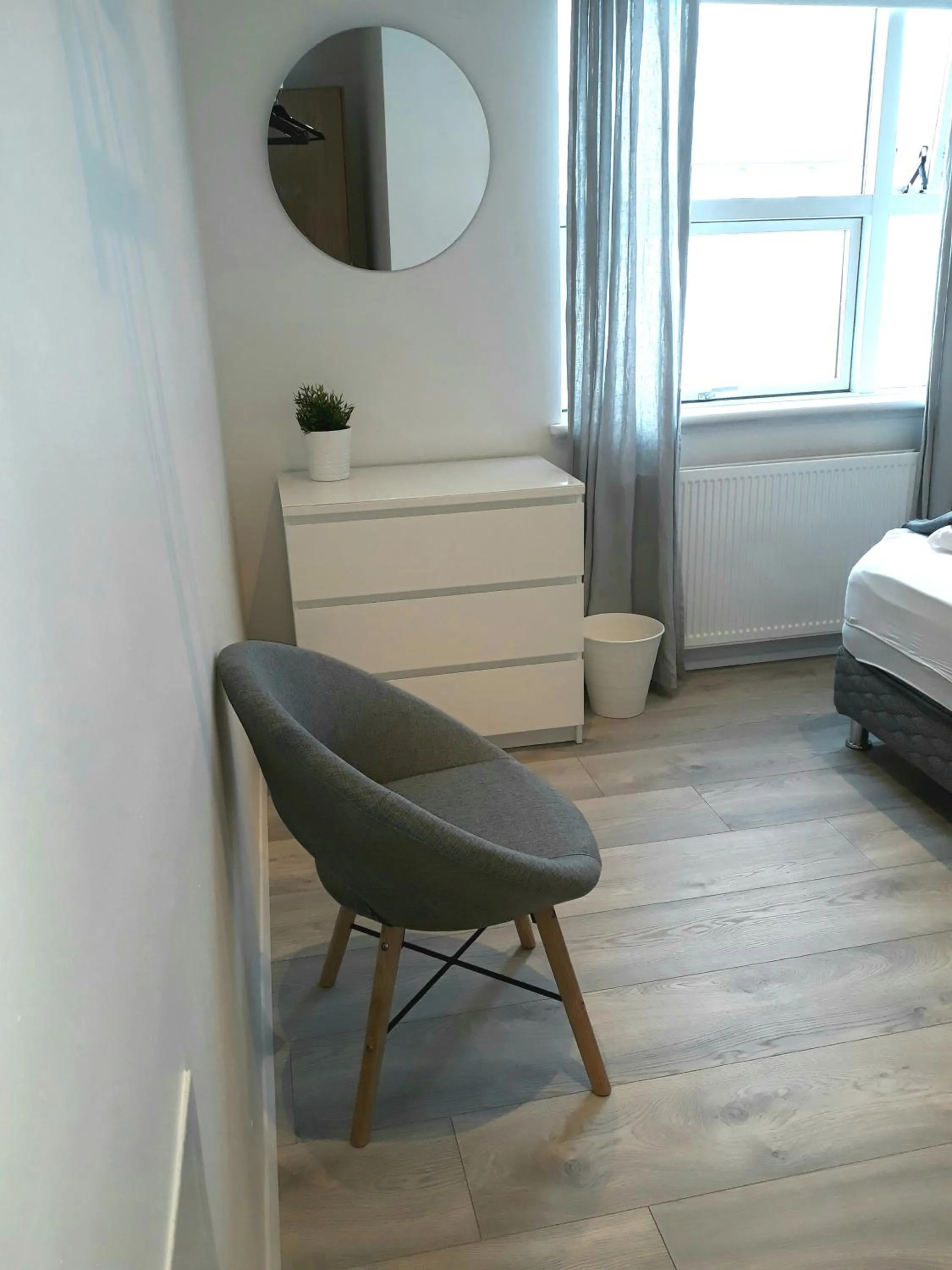 Seating area, Bed in Post-Plaza Guesthouse