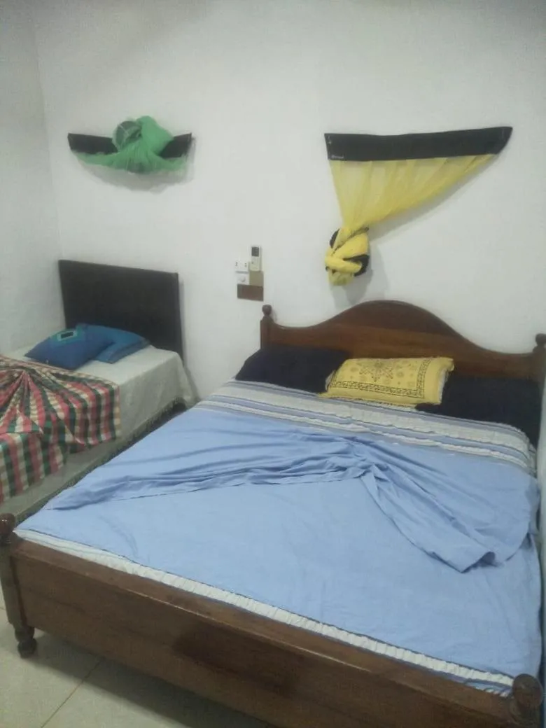 Bed in Bathiya Tourist Guest Anuradhapura