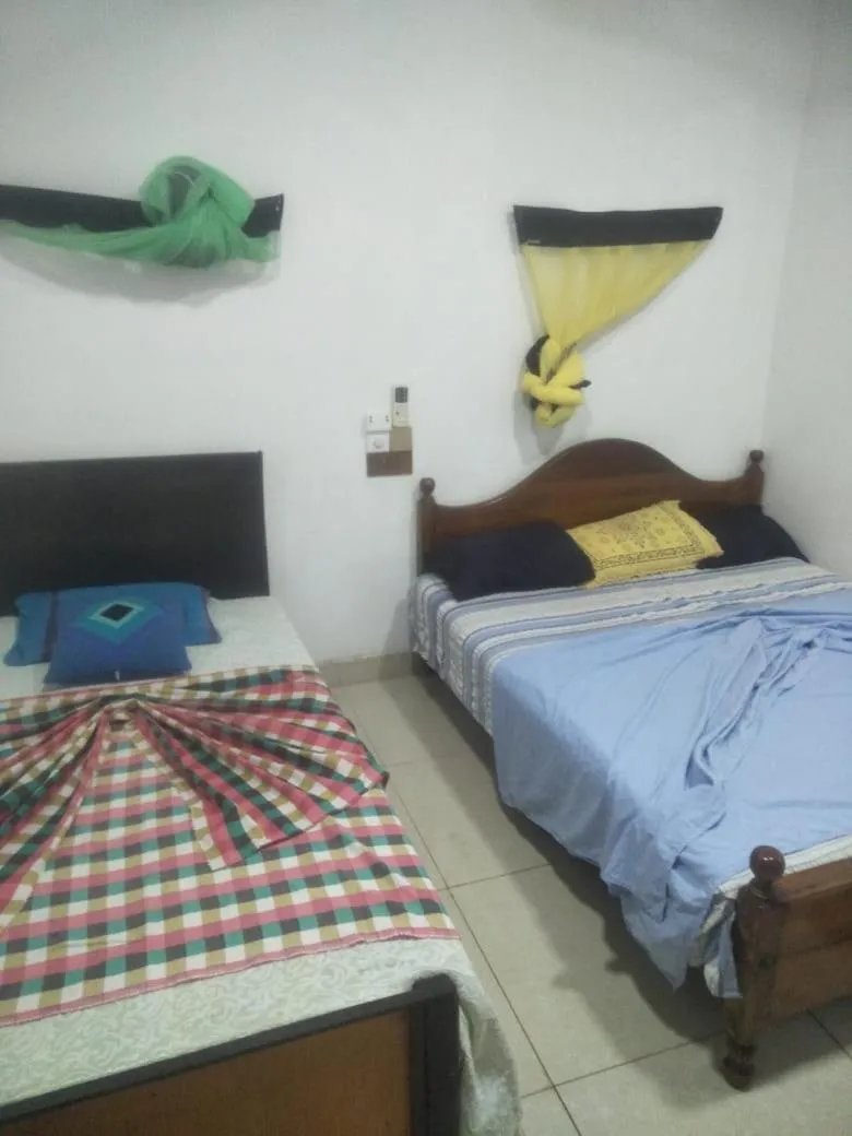Bed in Bathiya Tourist Guest Anuradhapura