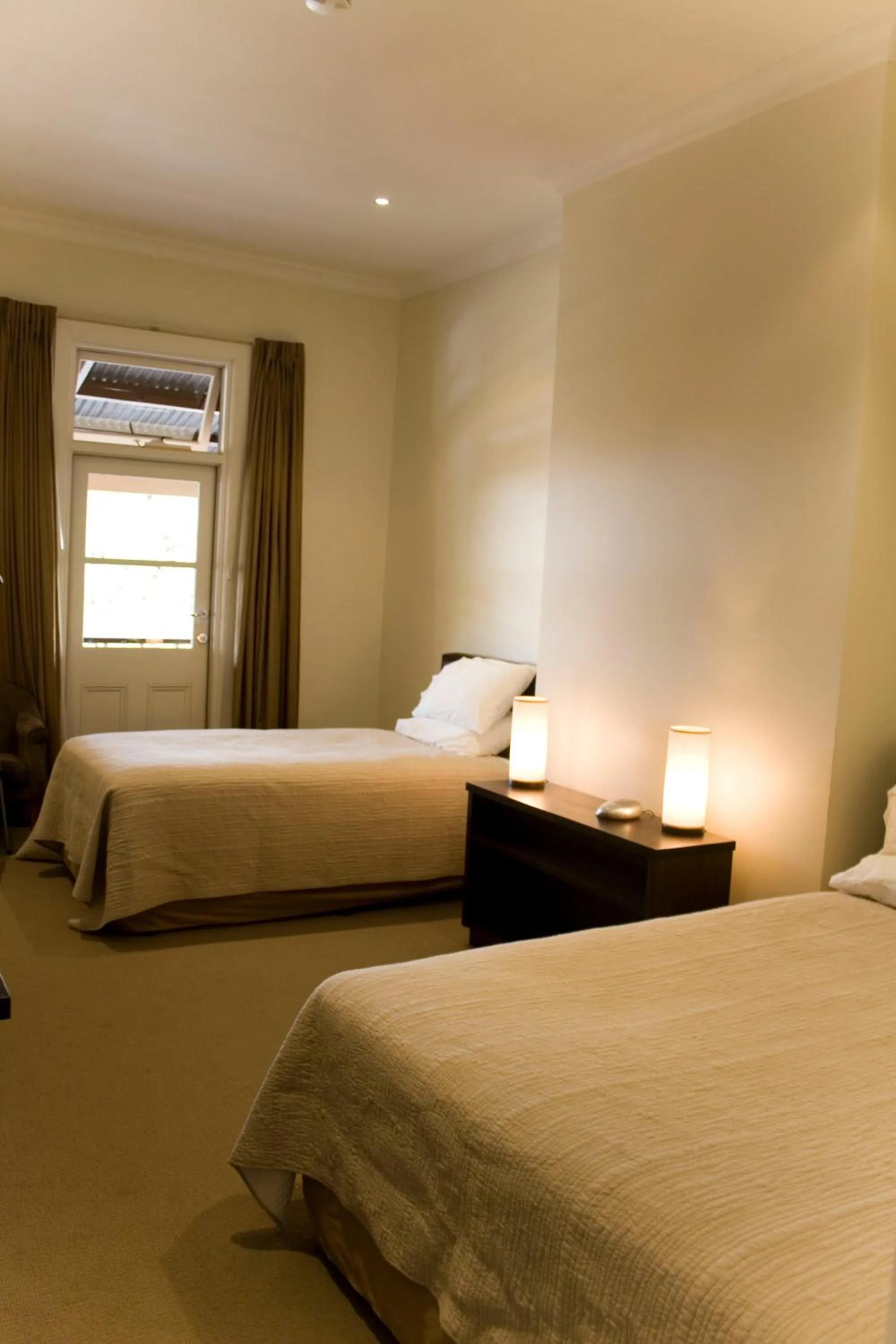 Bed in The Bridgetown Hotel