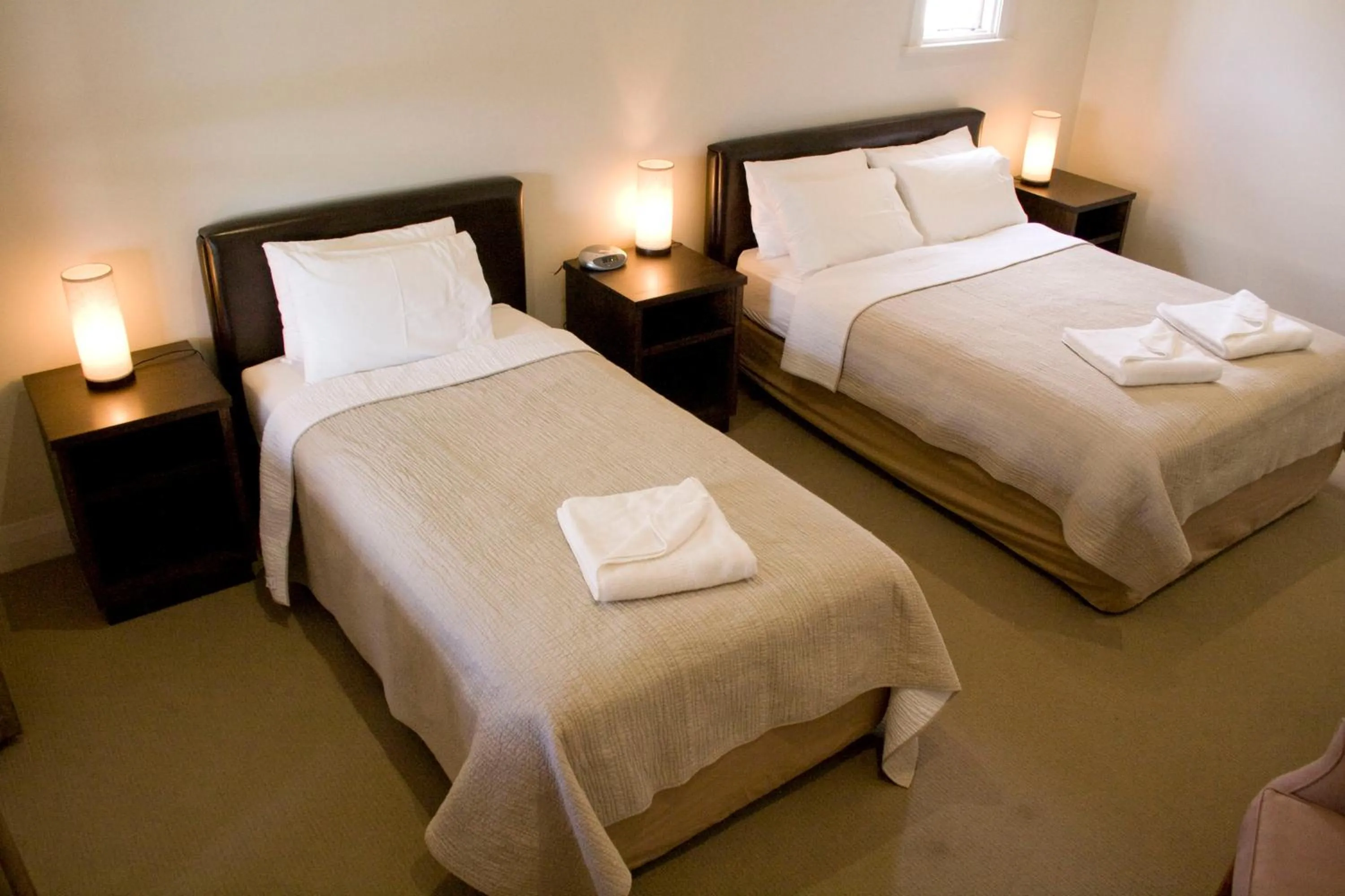 Bed in The Bridgetown Hotel