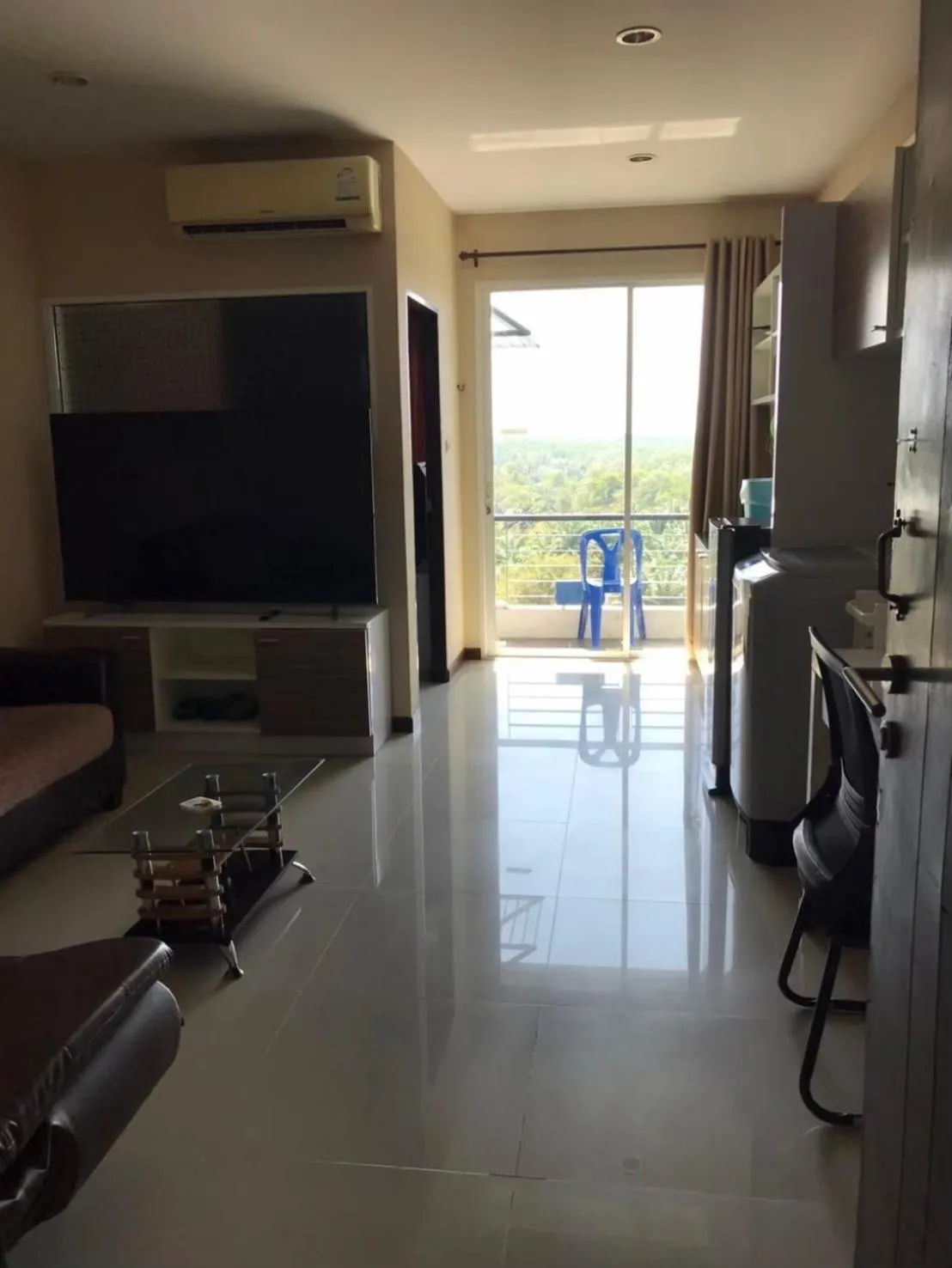 Communal lounge/ TV room in The Ozone Krabi Condotel