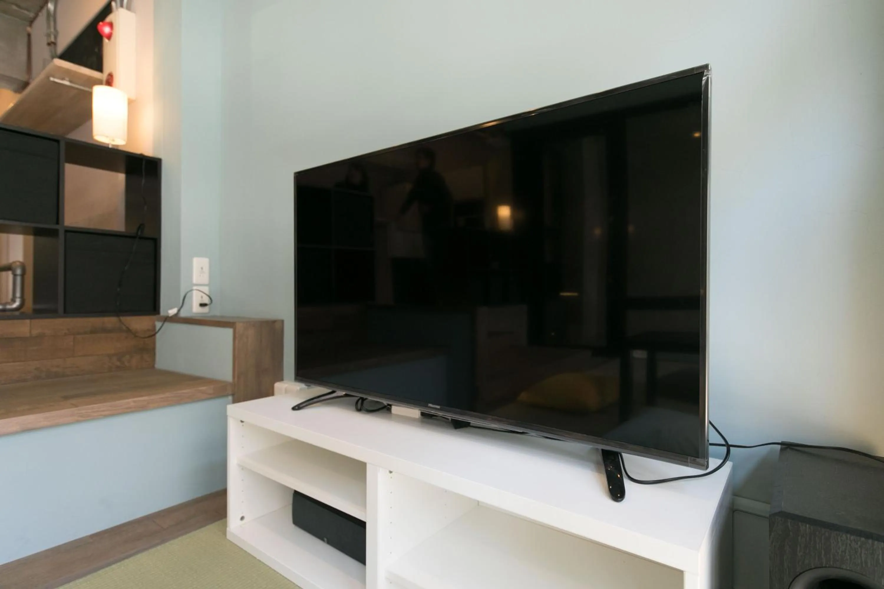 Communal lounge/ TV room in hostel DEN