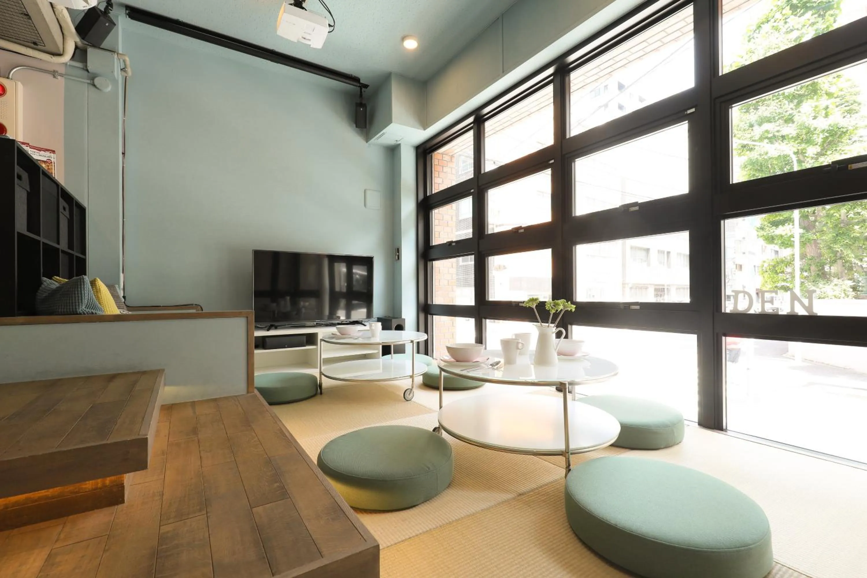 Communal lounge/ TV room in hostel DEN