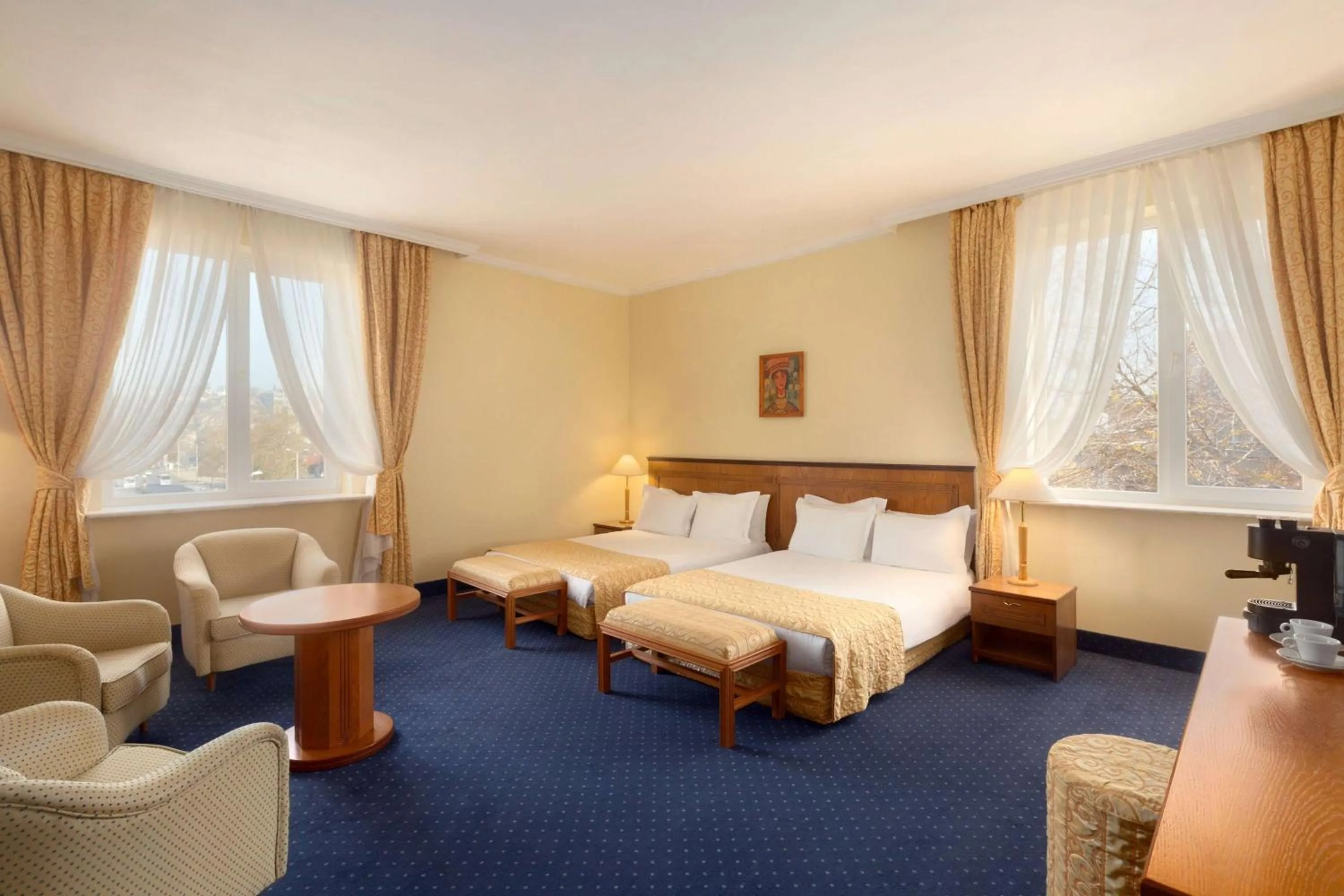 Photo of the whole room, Bed in Ramada by Wyndham Plovdiv Trimontium