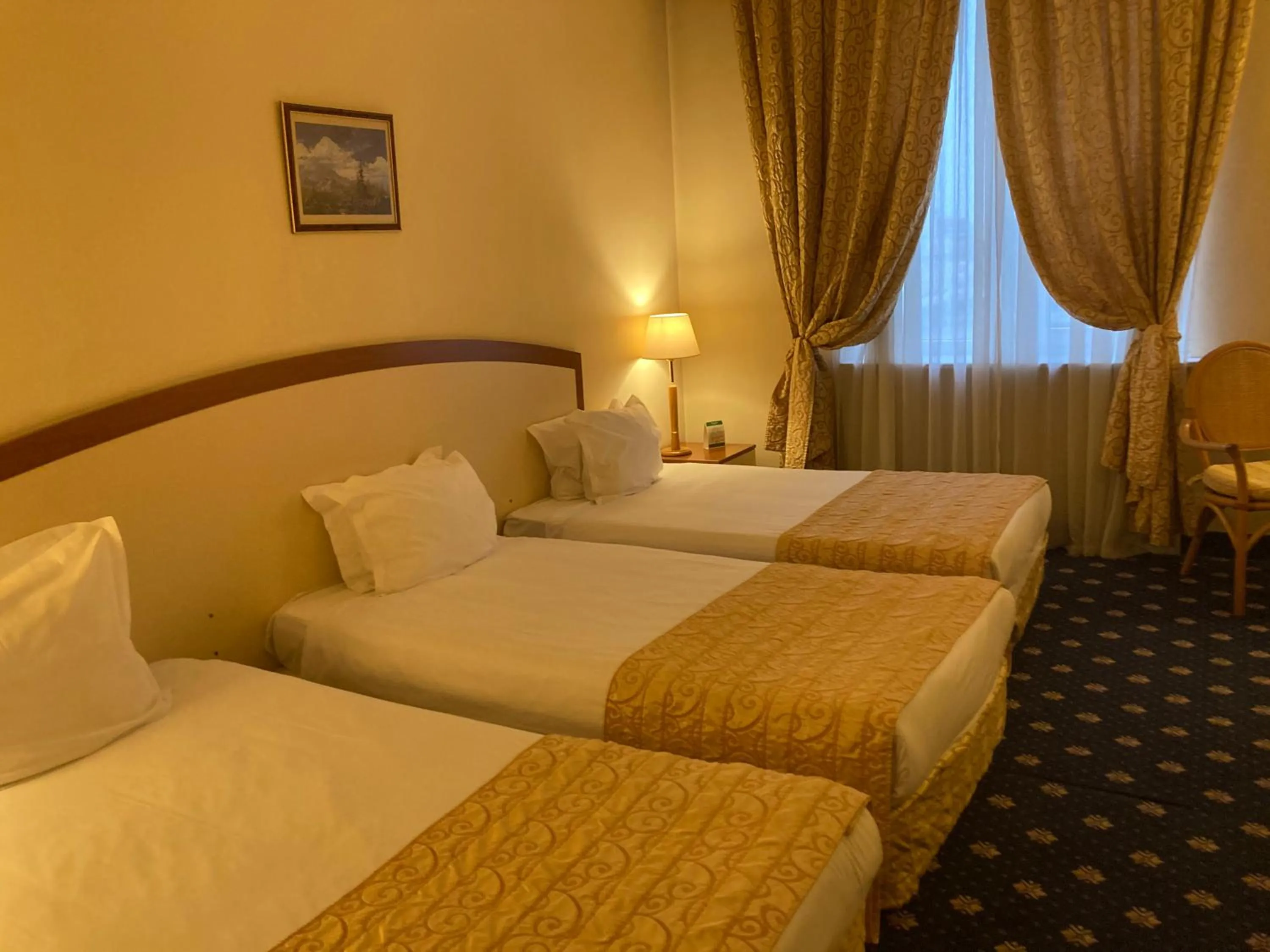 Photo of the whole room, Bed in Ramada by Wyndham Plovdiv Trimontium