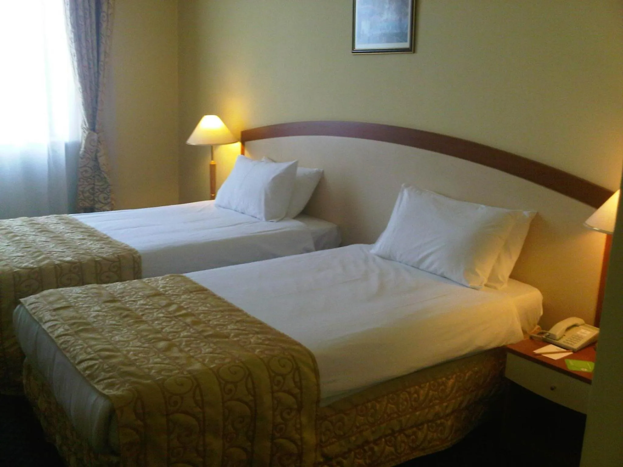 Photo of the whole room, Bed in Ramada by Wyndham Plovdiv Trimontium