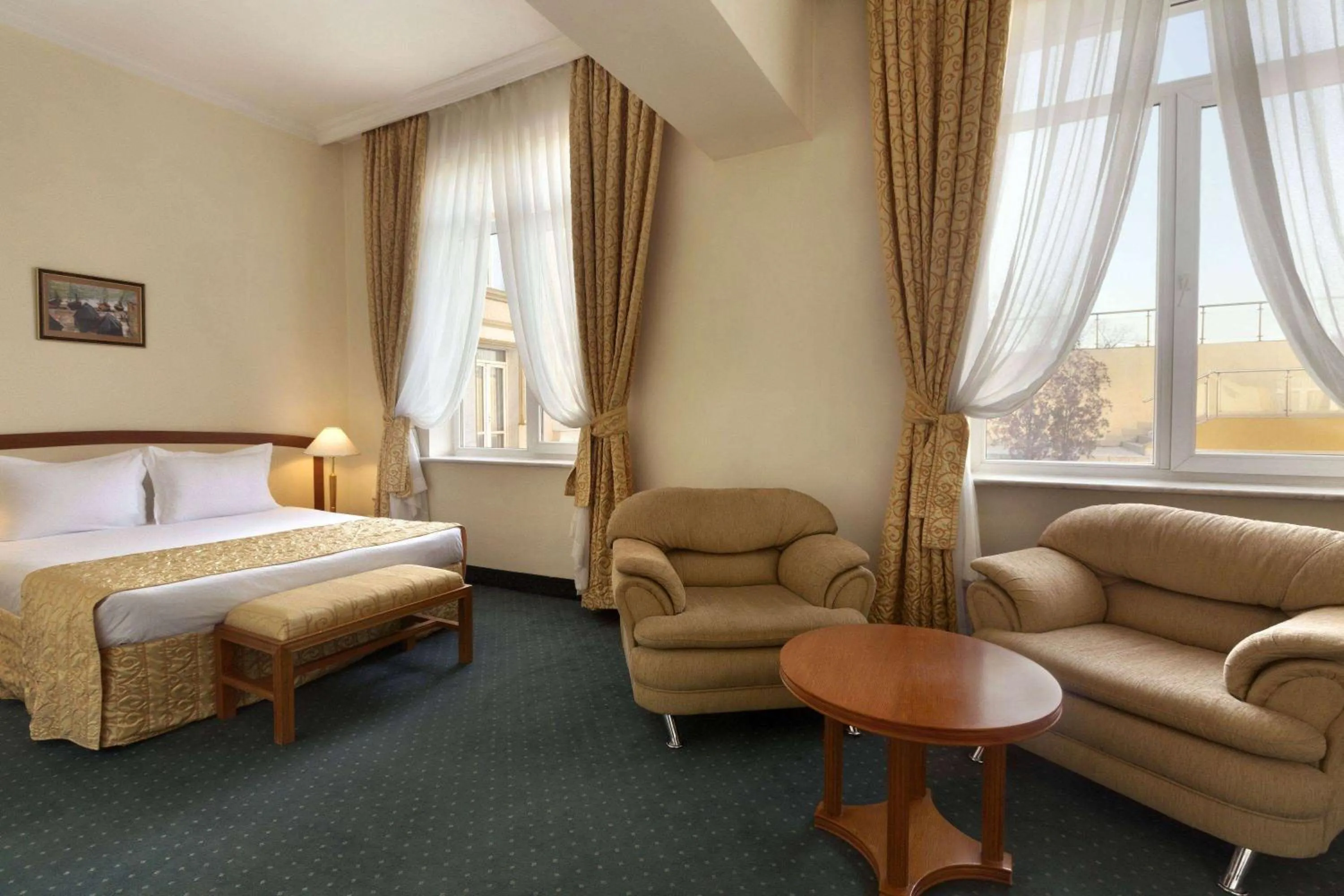 Photo of the whole room, Bed in Ramada by Wyndham Plovdiv Trimontium