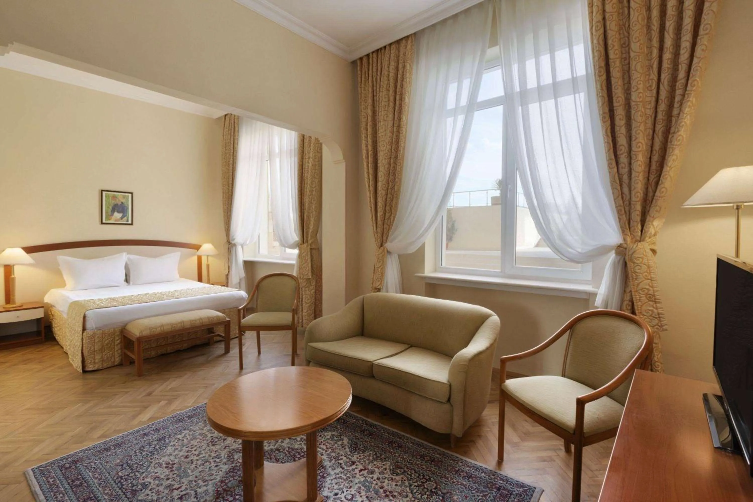 Photo of the whole room, Bed in Ramada by Wyndham Plovdiv Trimontium