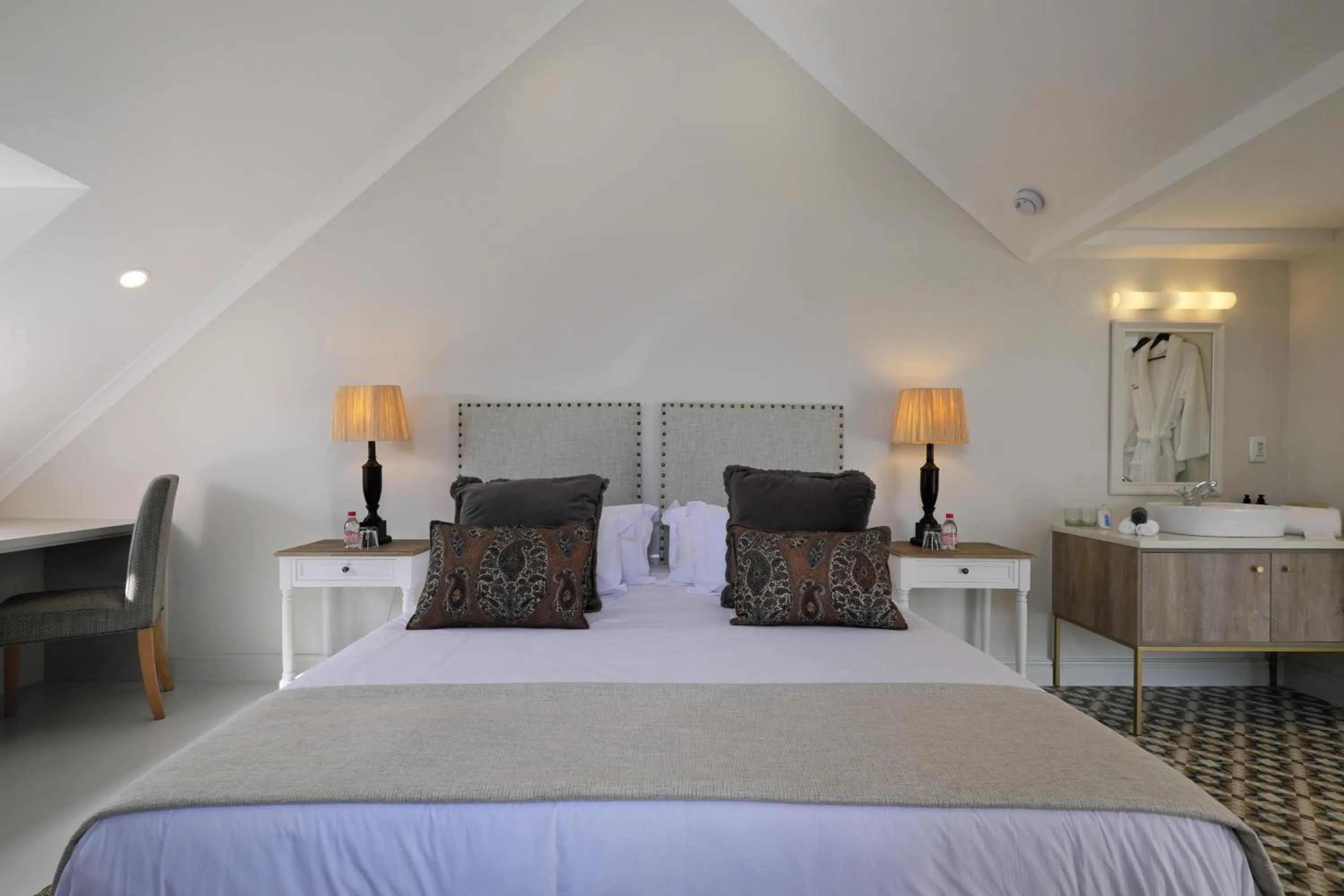 Bed in Chapter House Boutique Hotel by The Living Journey Collection