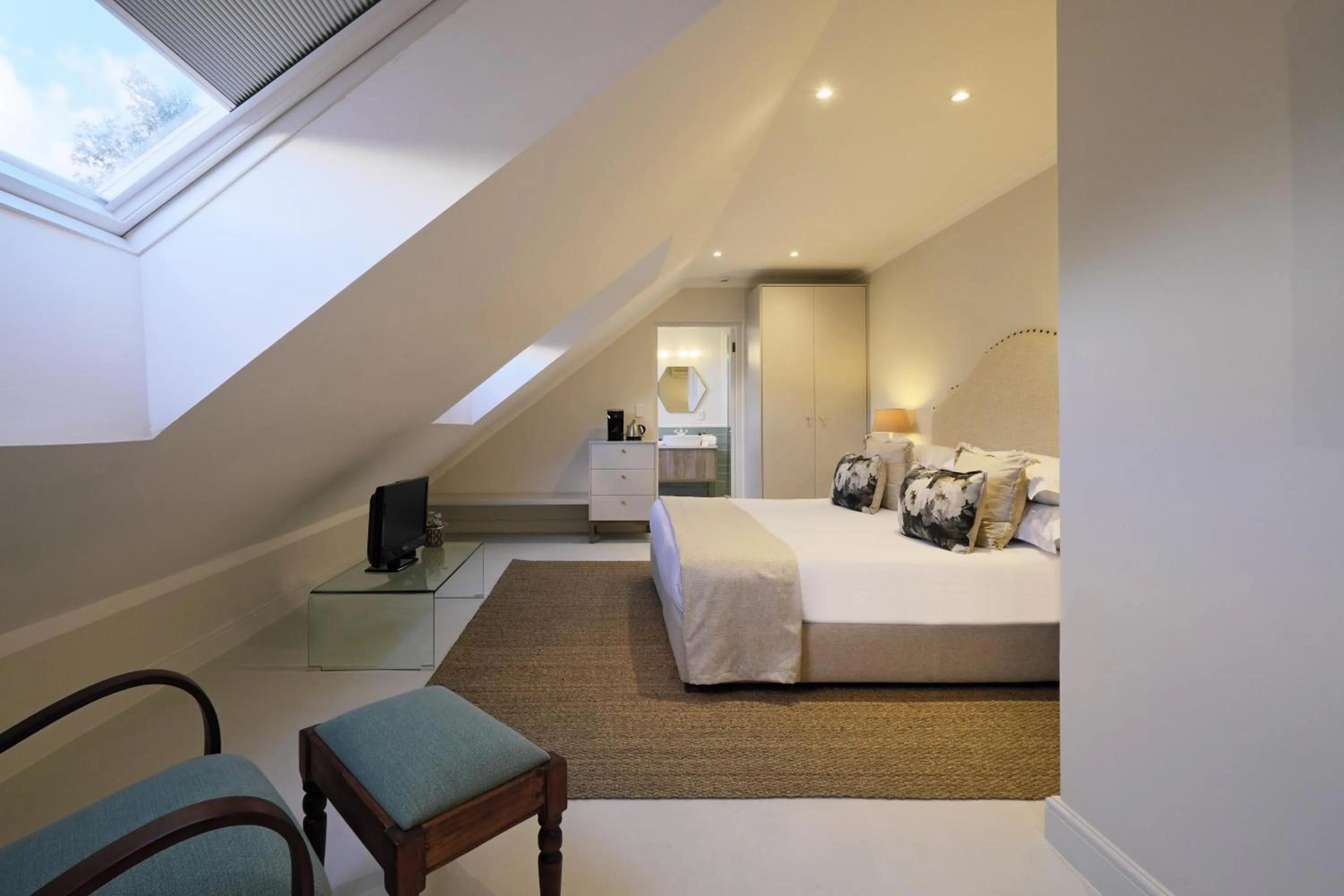 Seating area, Bed in Chapter House Boutique Hotel by The Living Journey Collection