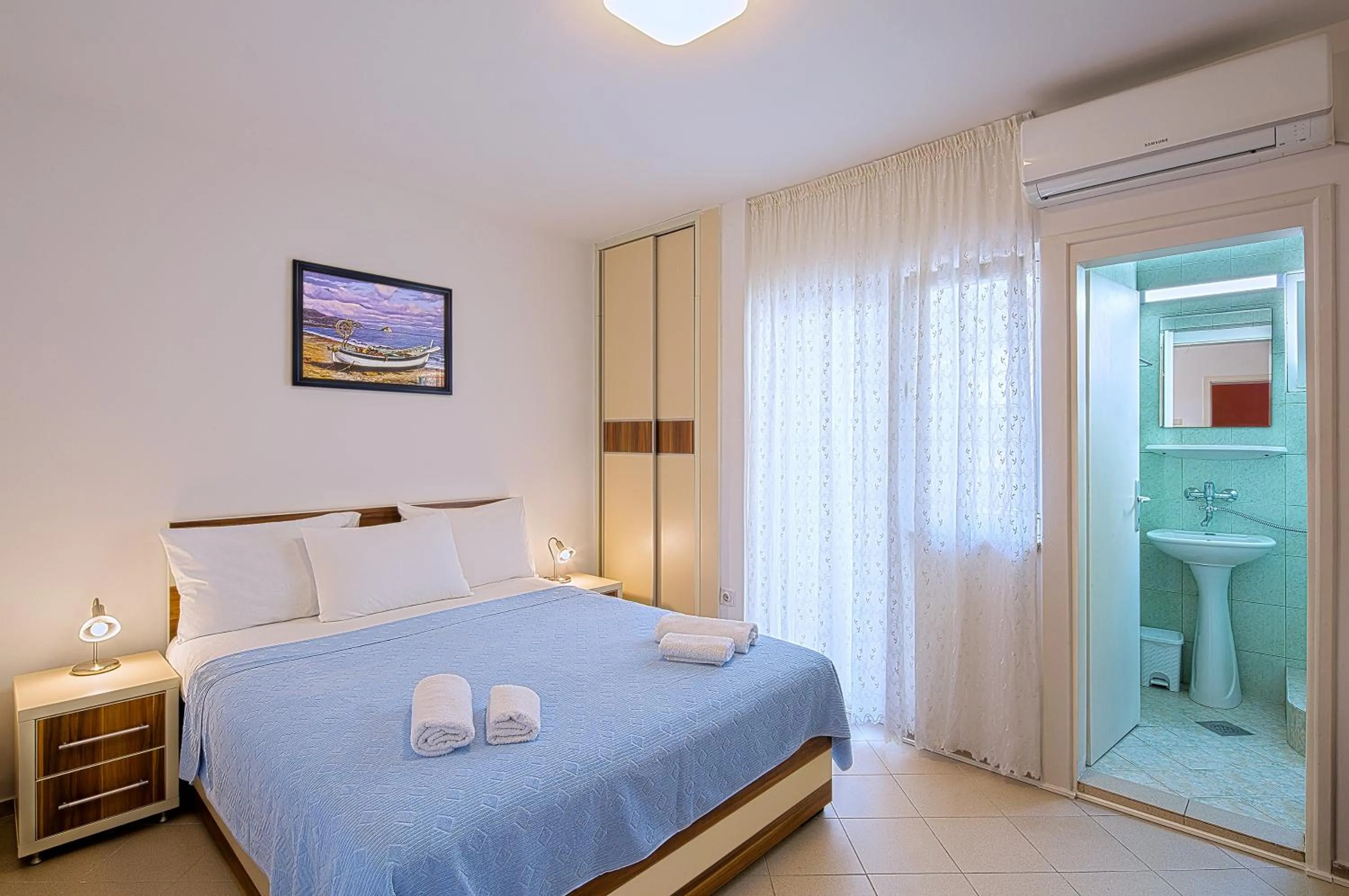 Bathroom, Bed in Apartments Bloom Bečići