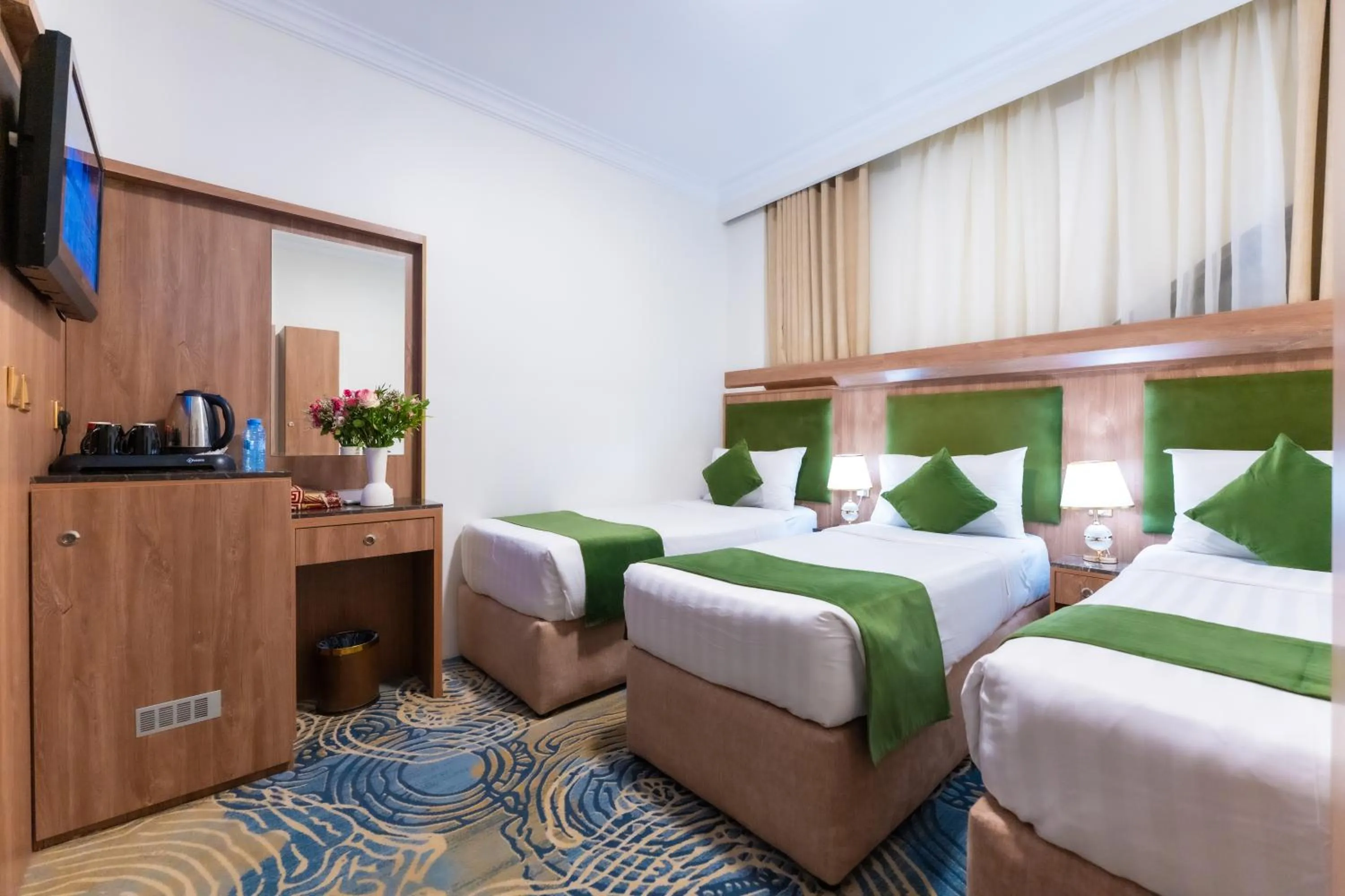 Bed in Hayah Plaza Hotel