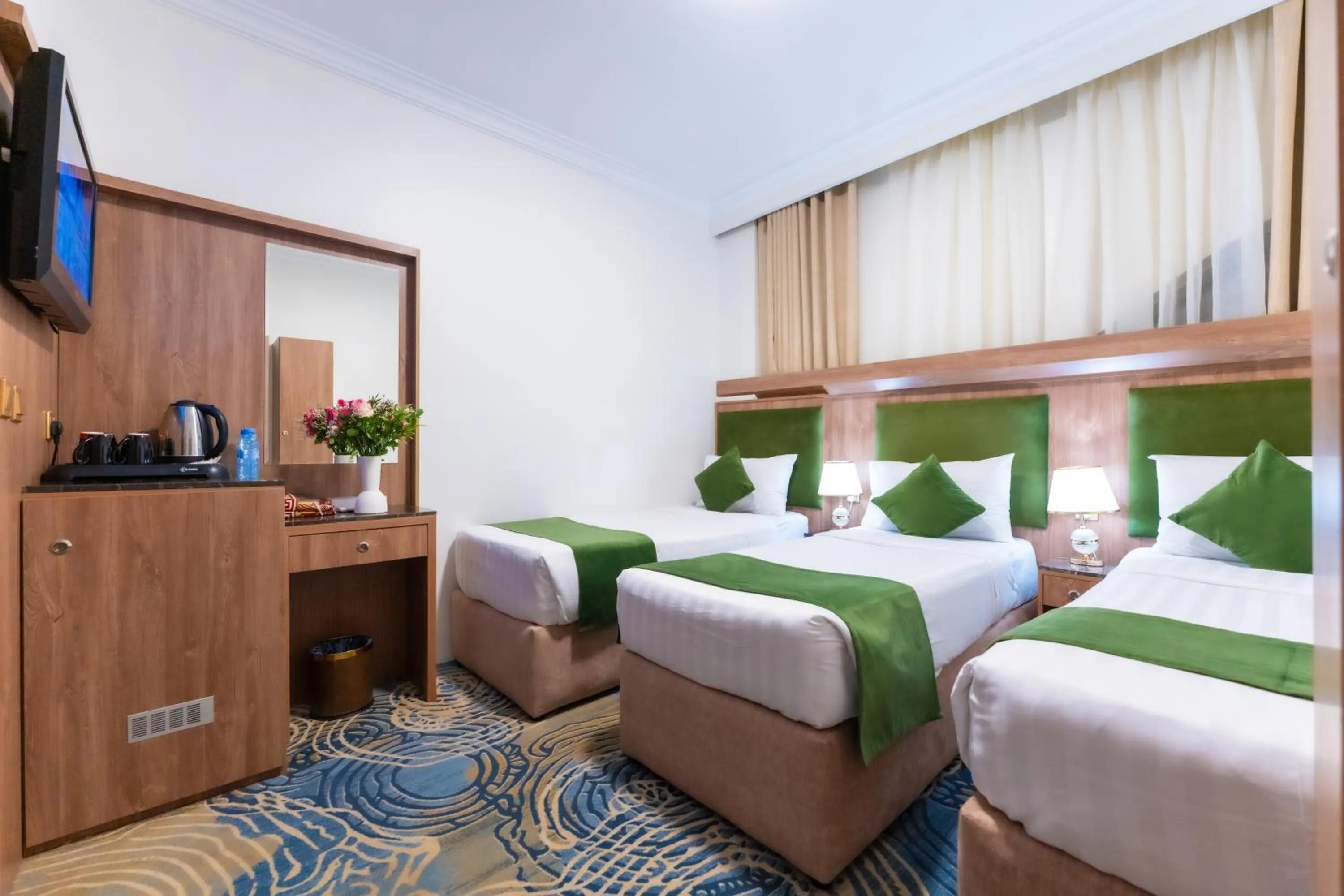 Bed in Hayah Plaza Hotel