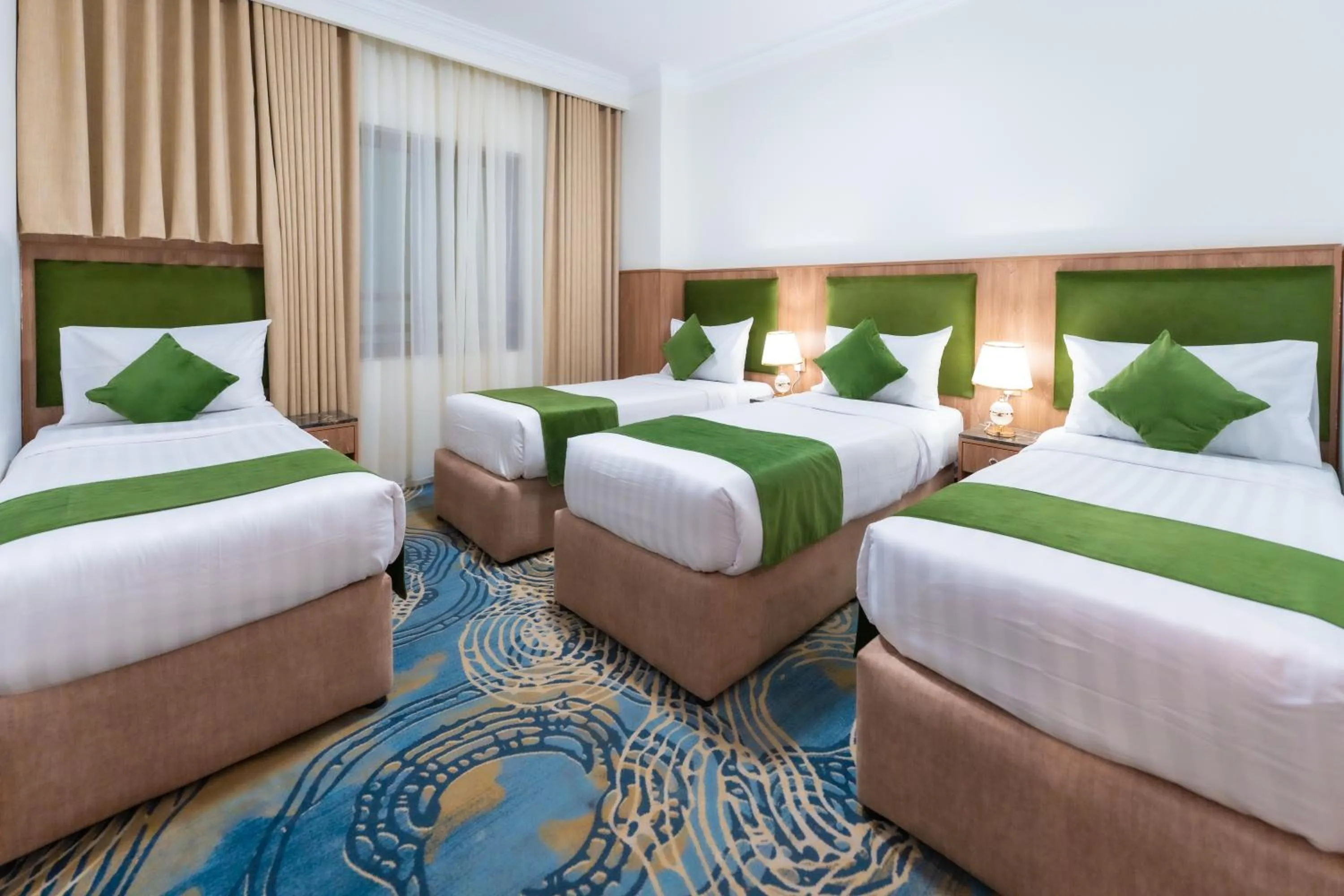 Bed in Hayah Plaza Hotel