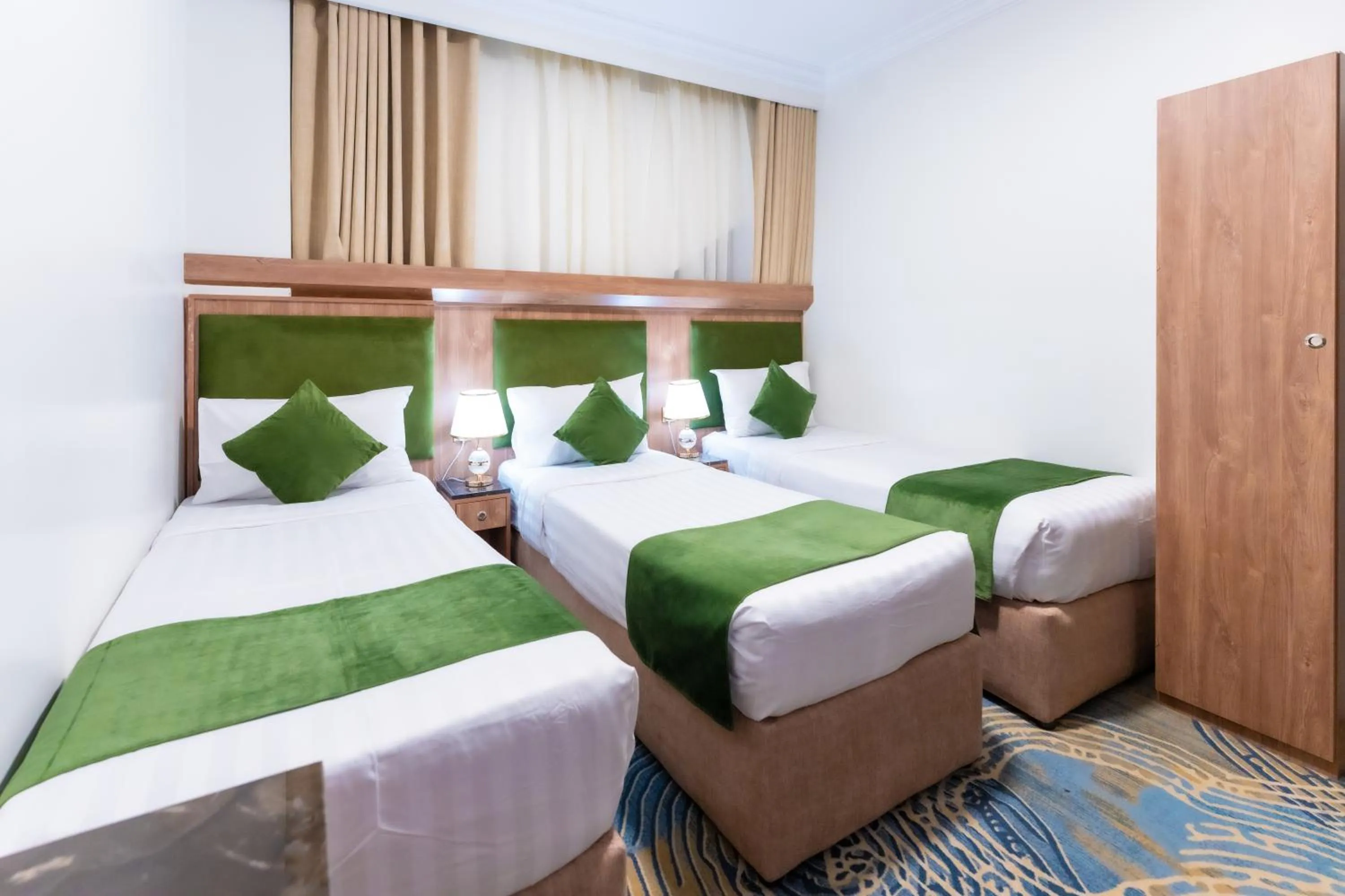 Bed in Hayah Plaza Hotel