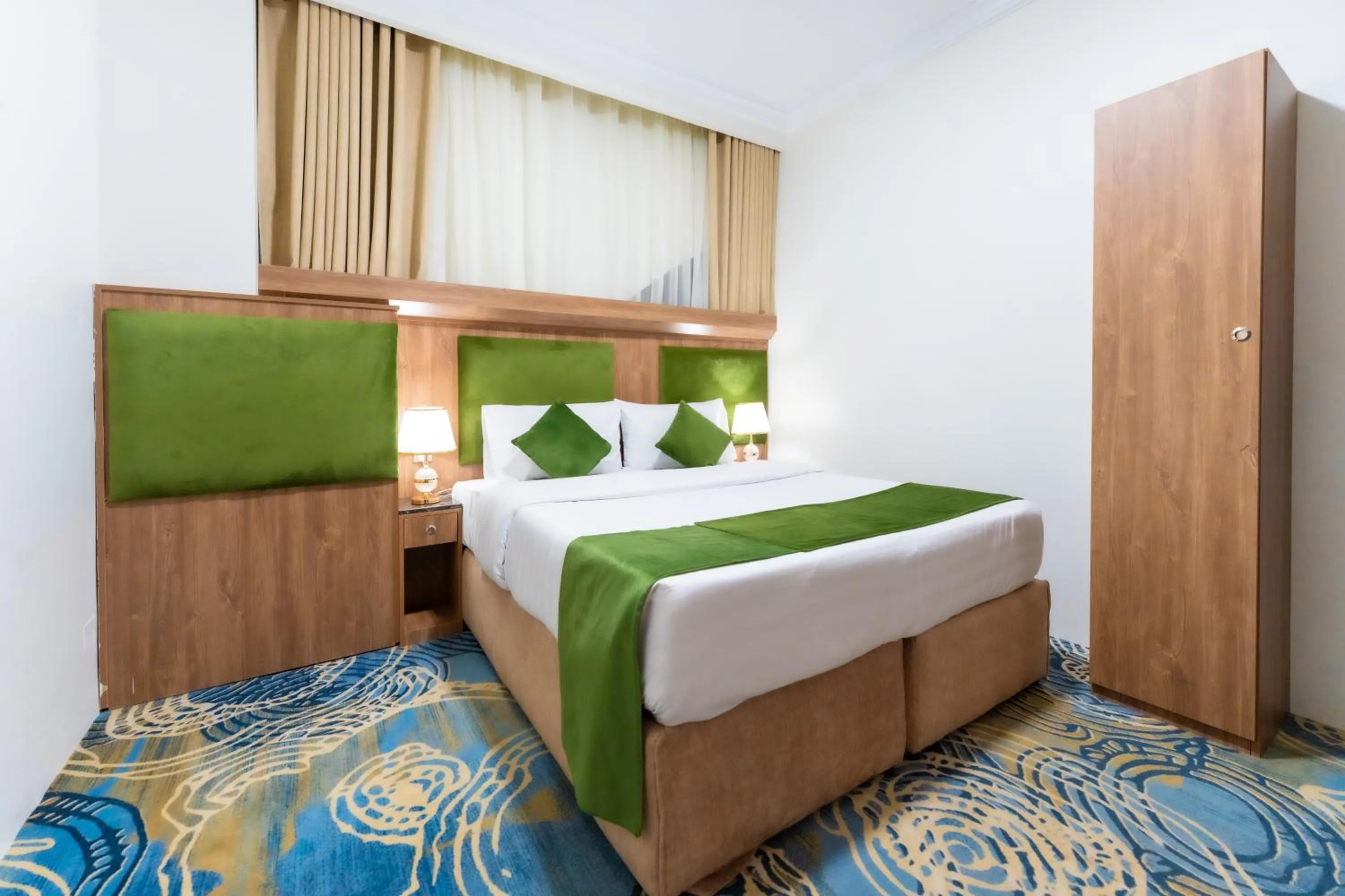 Bed in Hayah Plaza Hotel