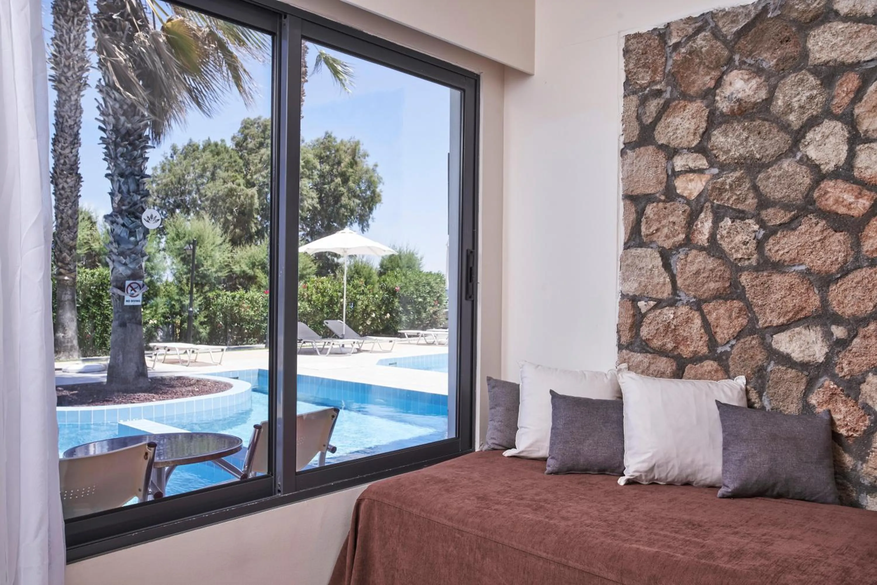 Photo of the whole room, Pool View in Blue Bay Resort