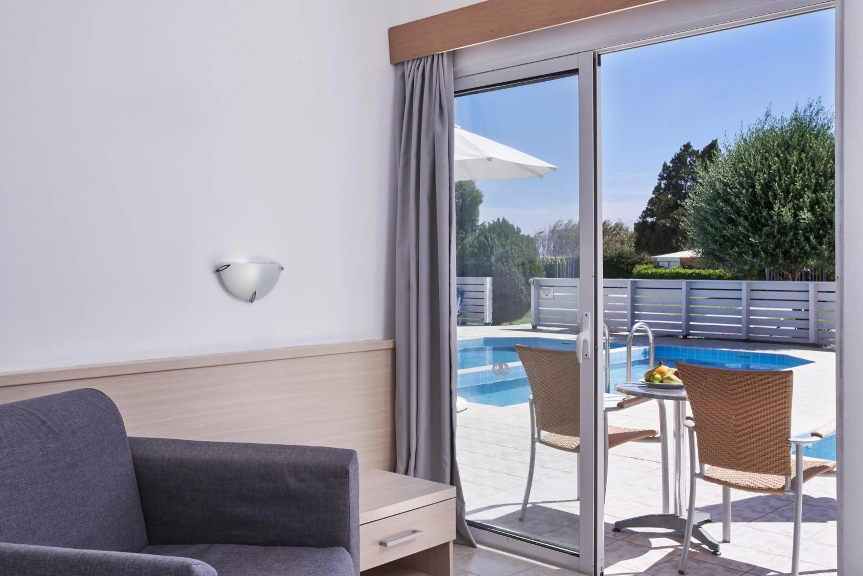 Photo of the whole room, Swimming Pool in Blue Bay Resort