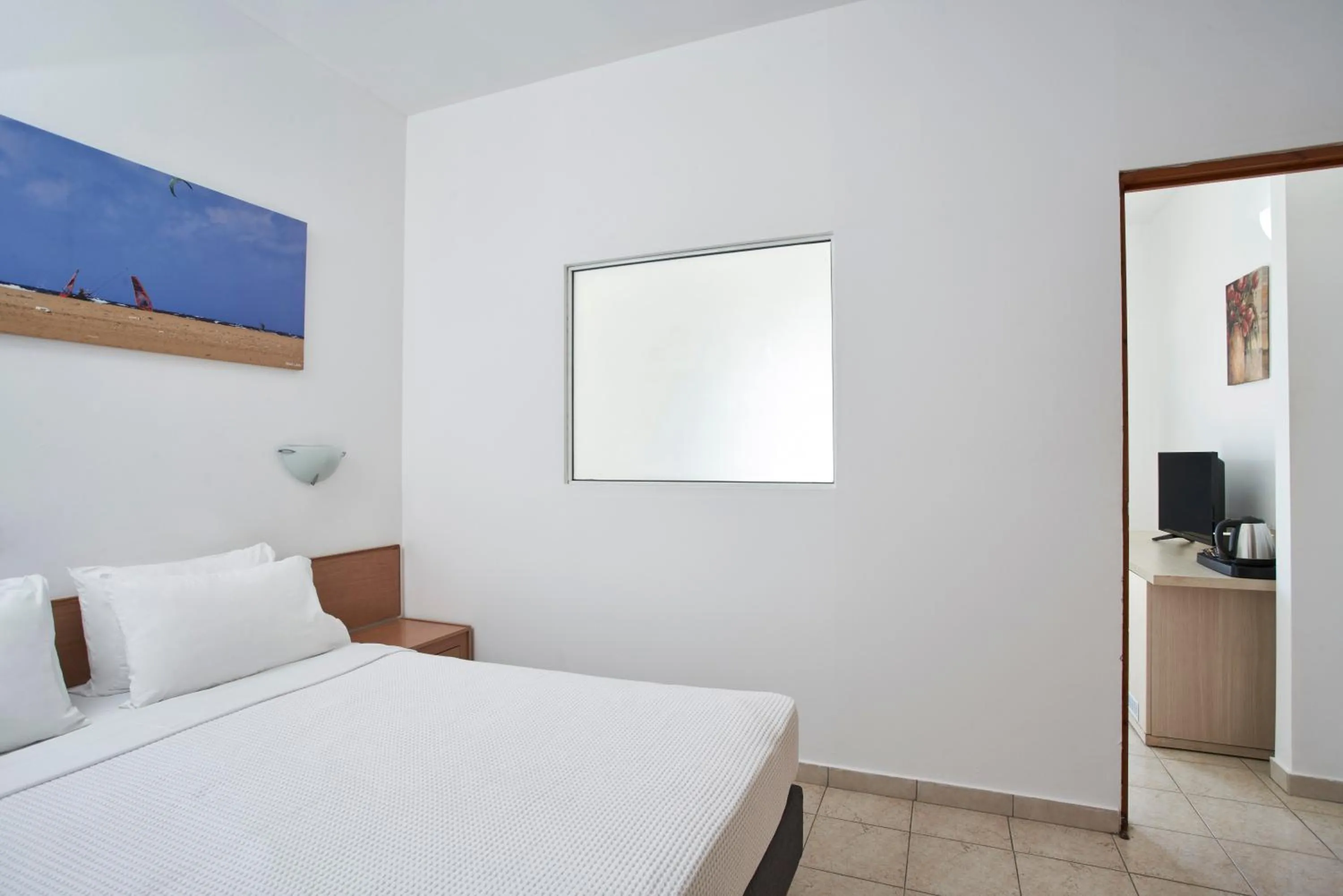 Bedroom, TV/Entertainment Center in Blue Bay Resort