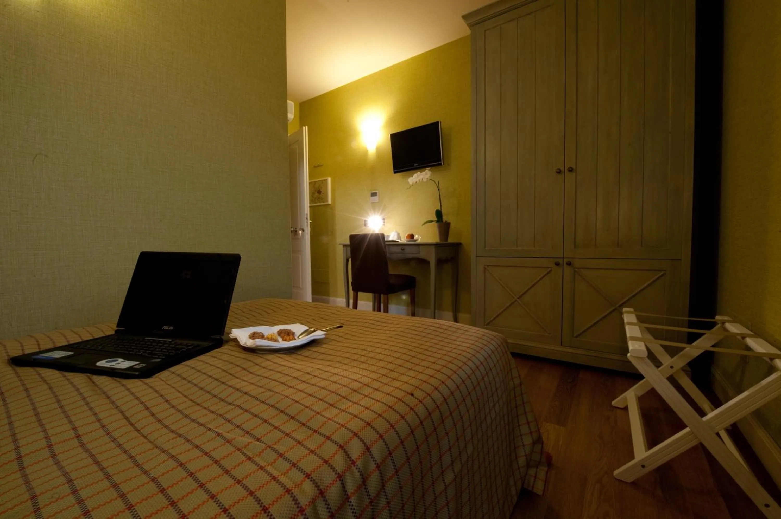 Bed in Hotel Locanda Stendhal