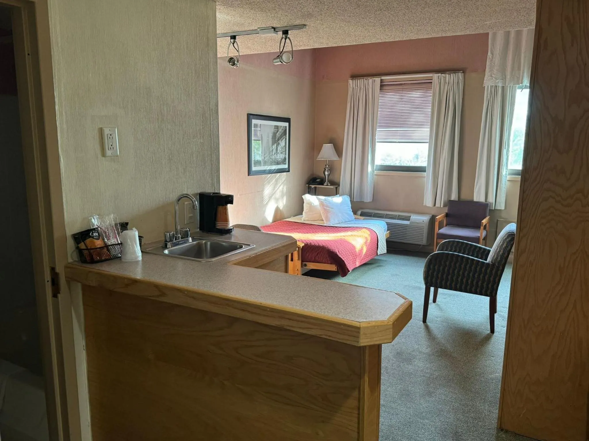 Bed in FairBridge Inn and Suites West Point