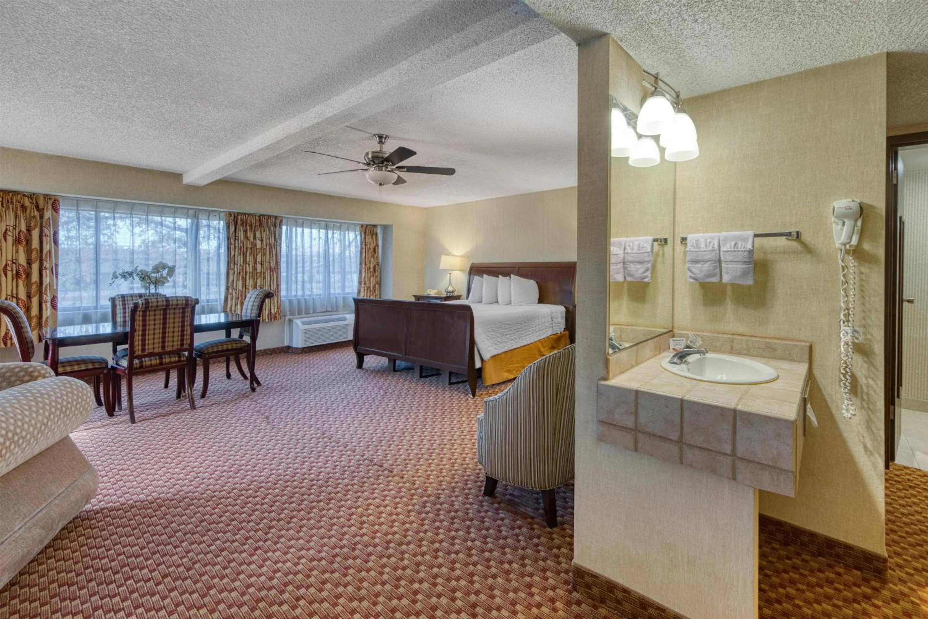 Bedroom, Bed in SureStay Plus Hotel by Best Western Reno Airport