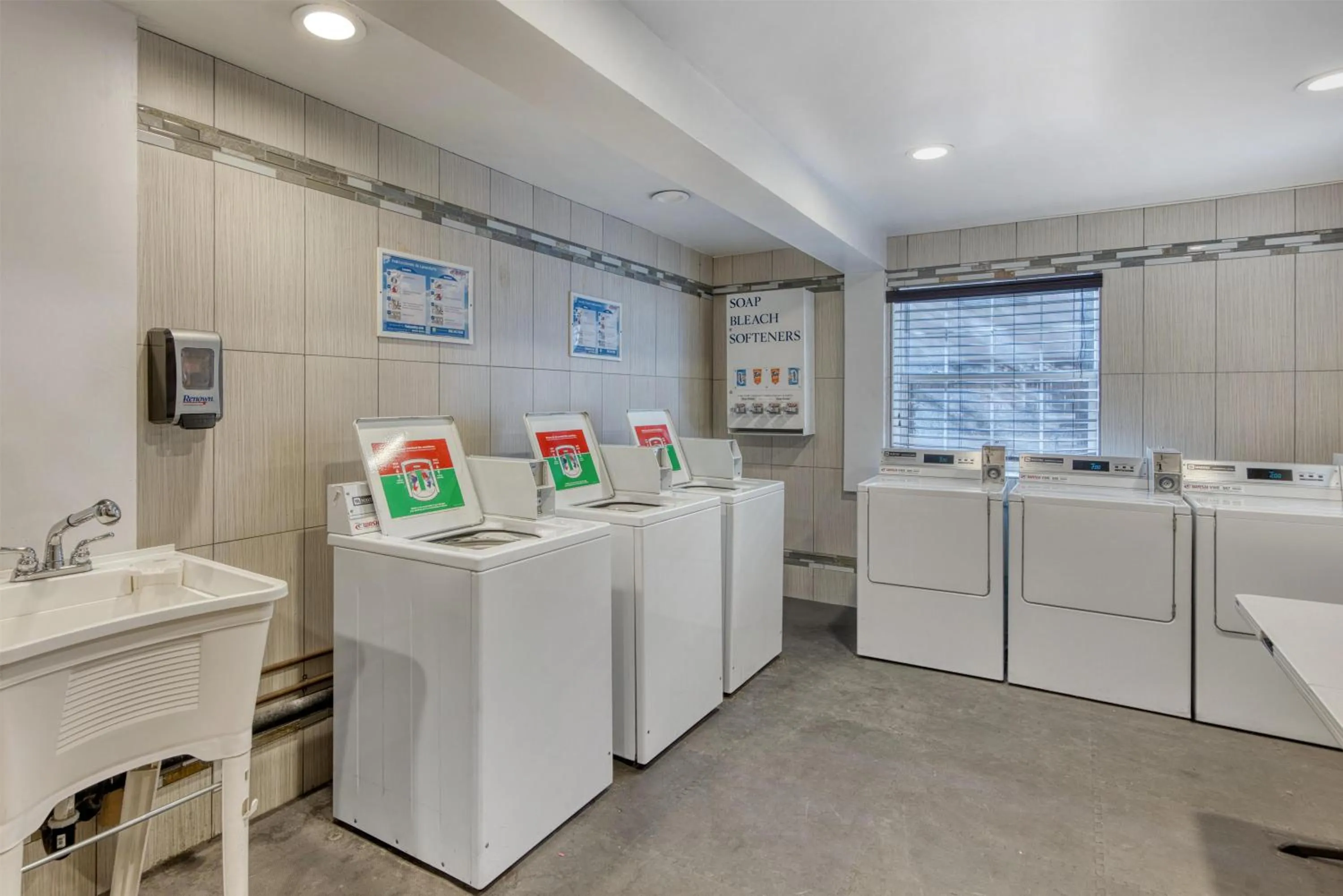 laundry in SureStay Plus Hotel by Best Western Reno Airport