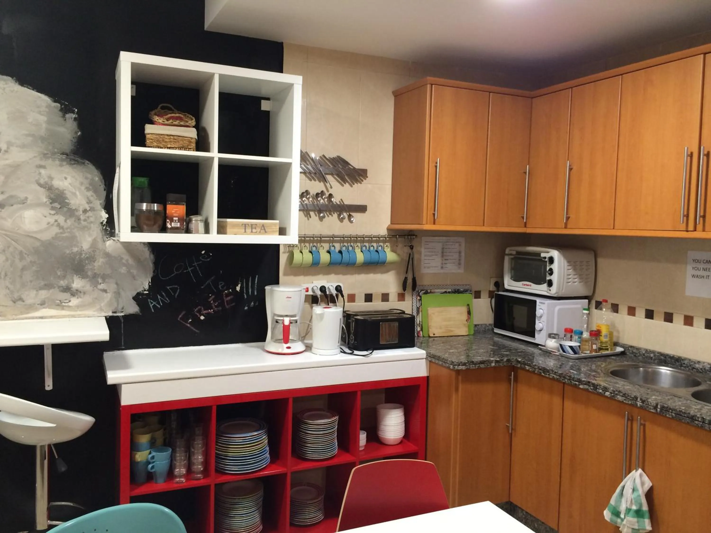 Communal kitchen in Oh! My Hostel